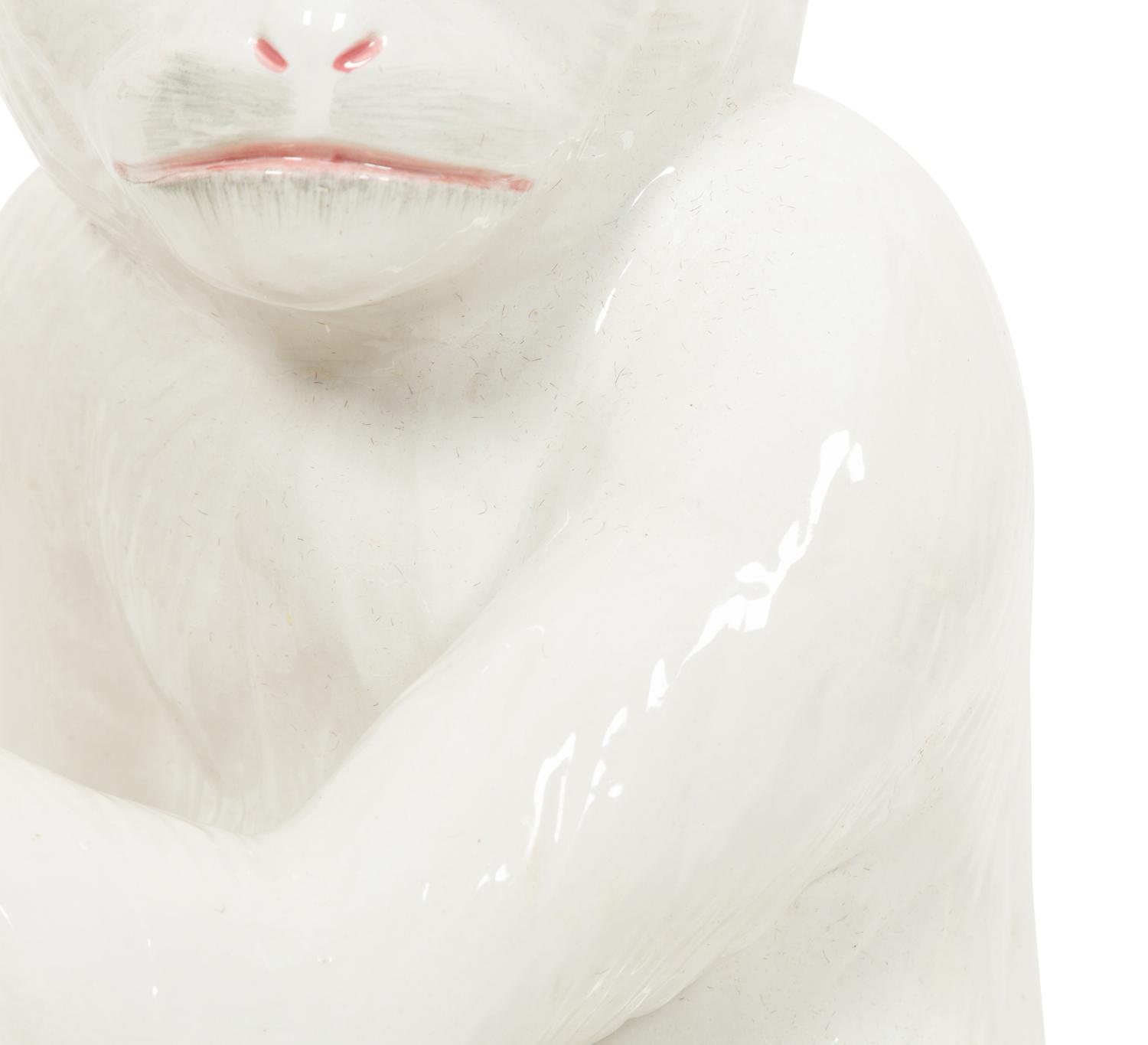 An Italian White Glazed Ceramic Monkey