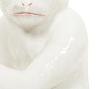 An Italian White Glazed Ceramic Monkey