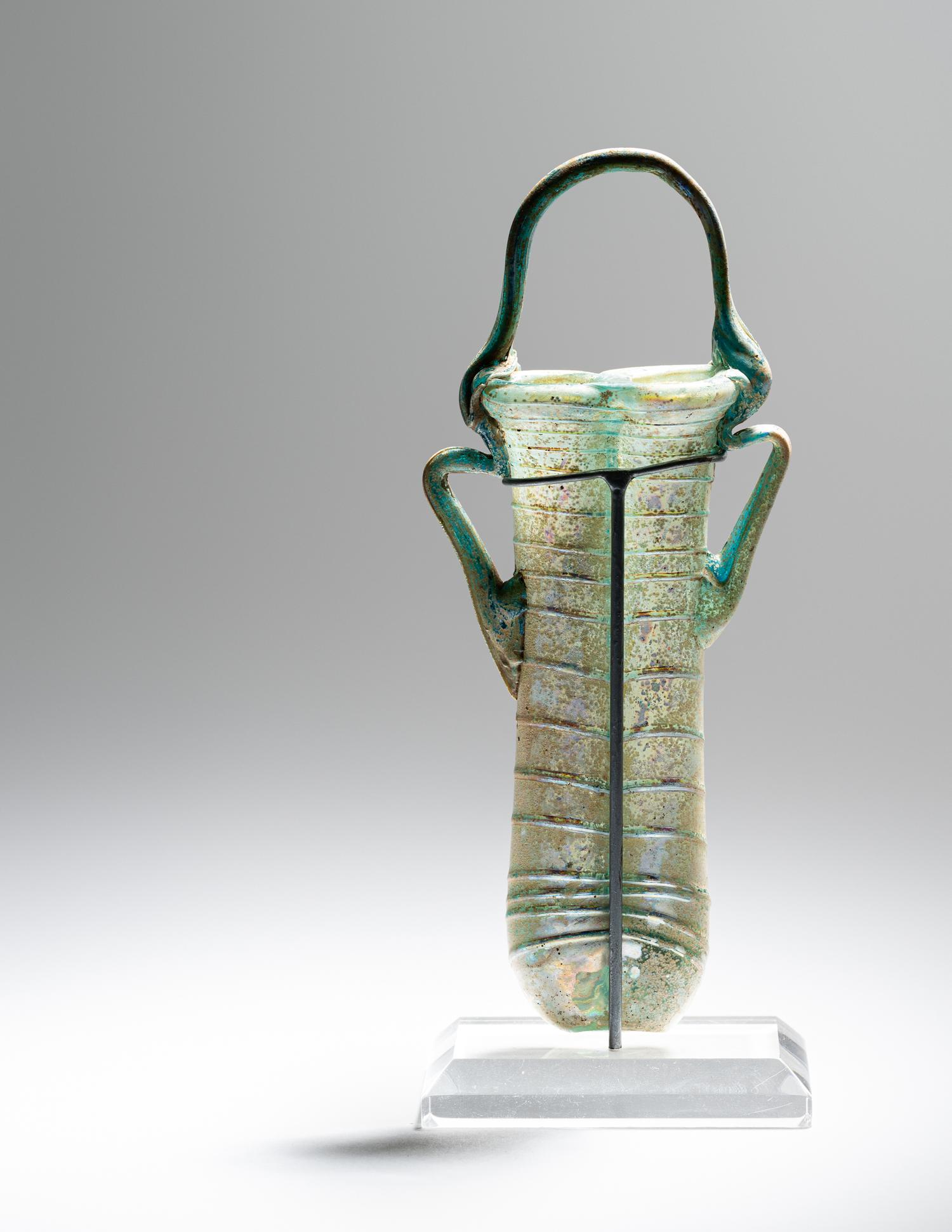 A Roman Green Glass Double Unguentarium
