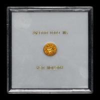 An 1853-C Liberty Head $1 Gold Coin