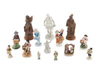 A Group of Fourteen Street Organist Figurines