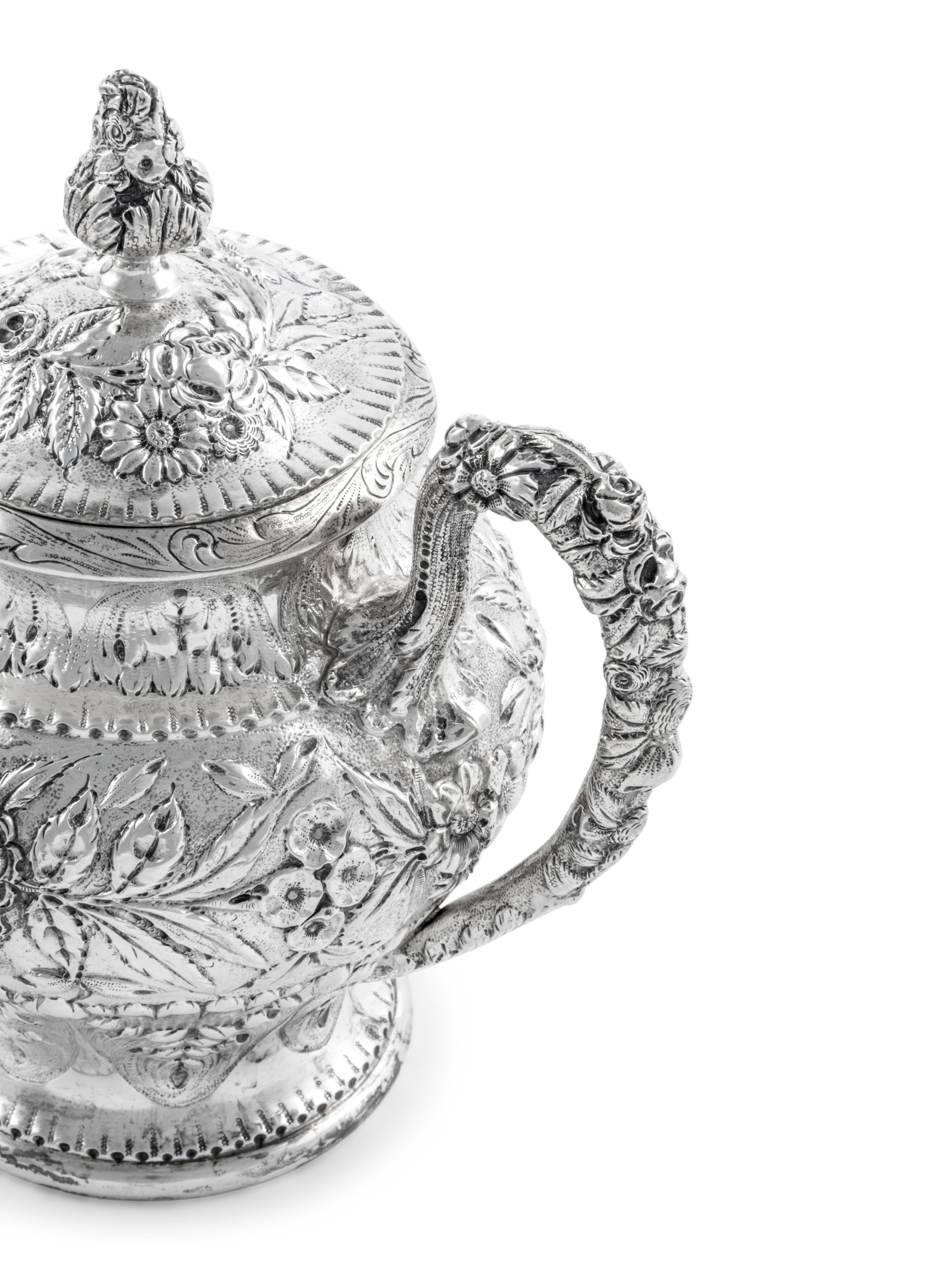 An American Silver Repoussé Six-Piece Tea and Coffee Service