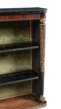 A Regency Parcel Gilt and Ebonized Mahogany Étagère