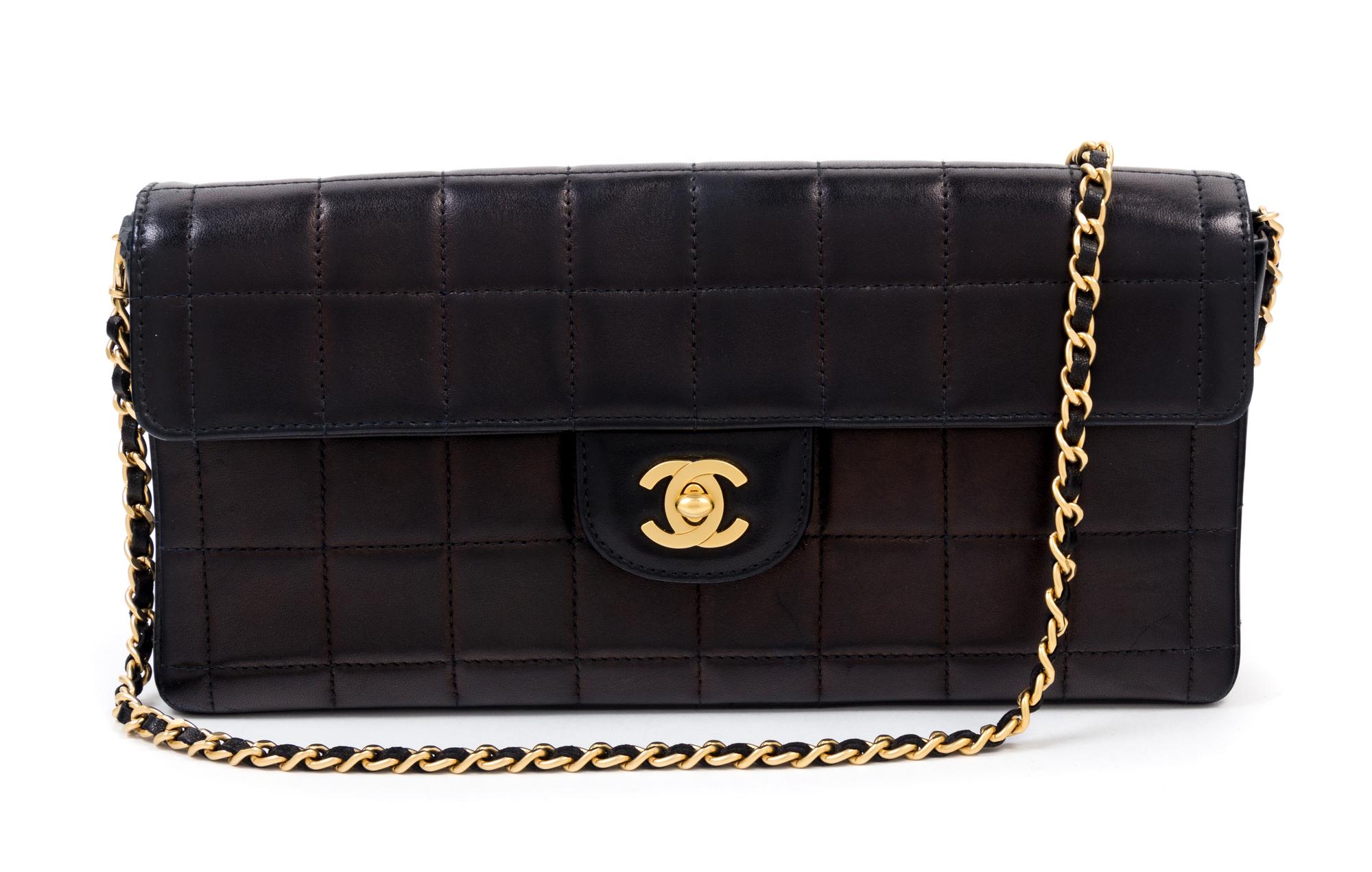 A Chanel Black Lambskin Chocolate Bar Flap Handbag, 10.5" x 5.5" x 1.5"; Strap drop: 12".