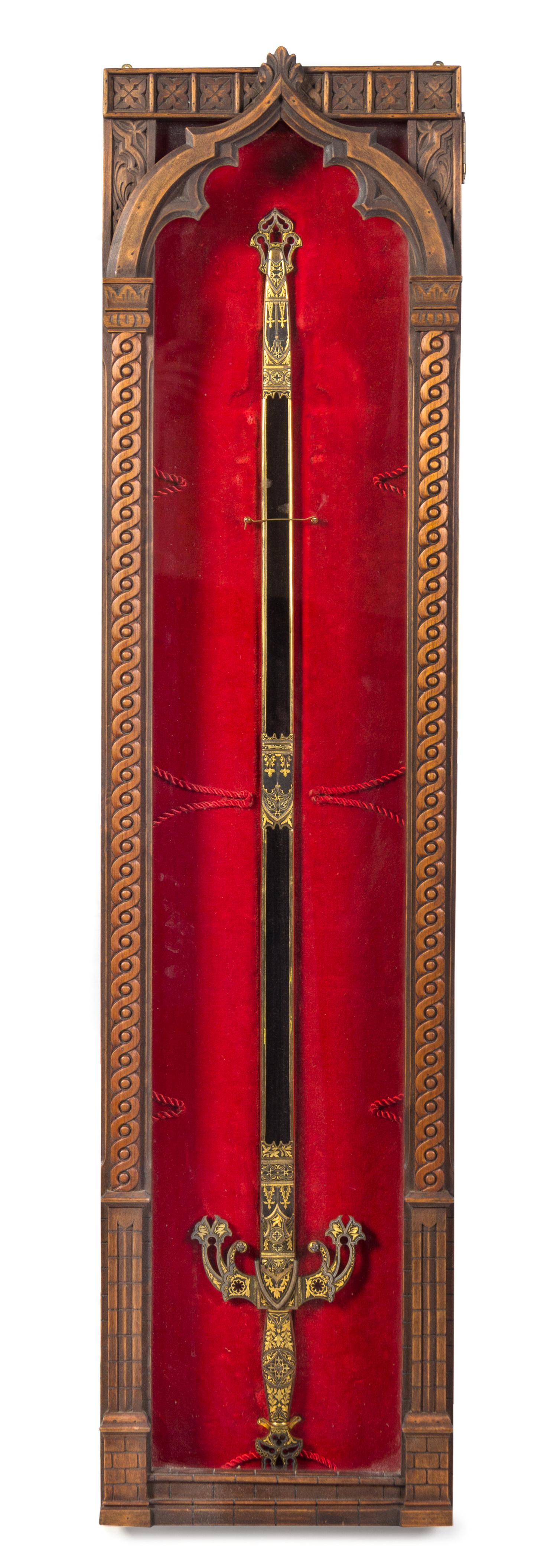 A Cased Decorative Sword and Sheath Length of case 45 inches.