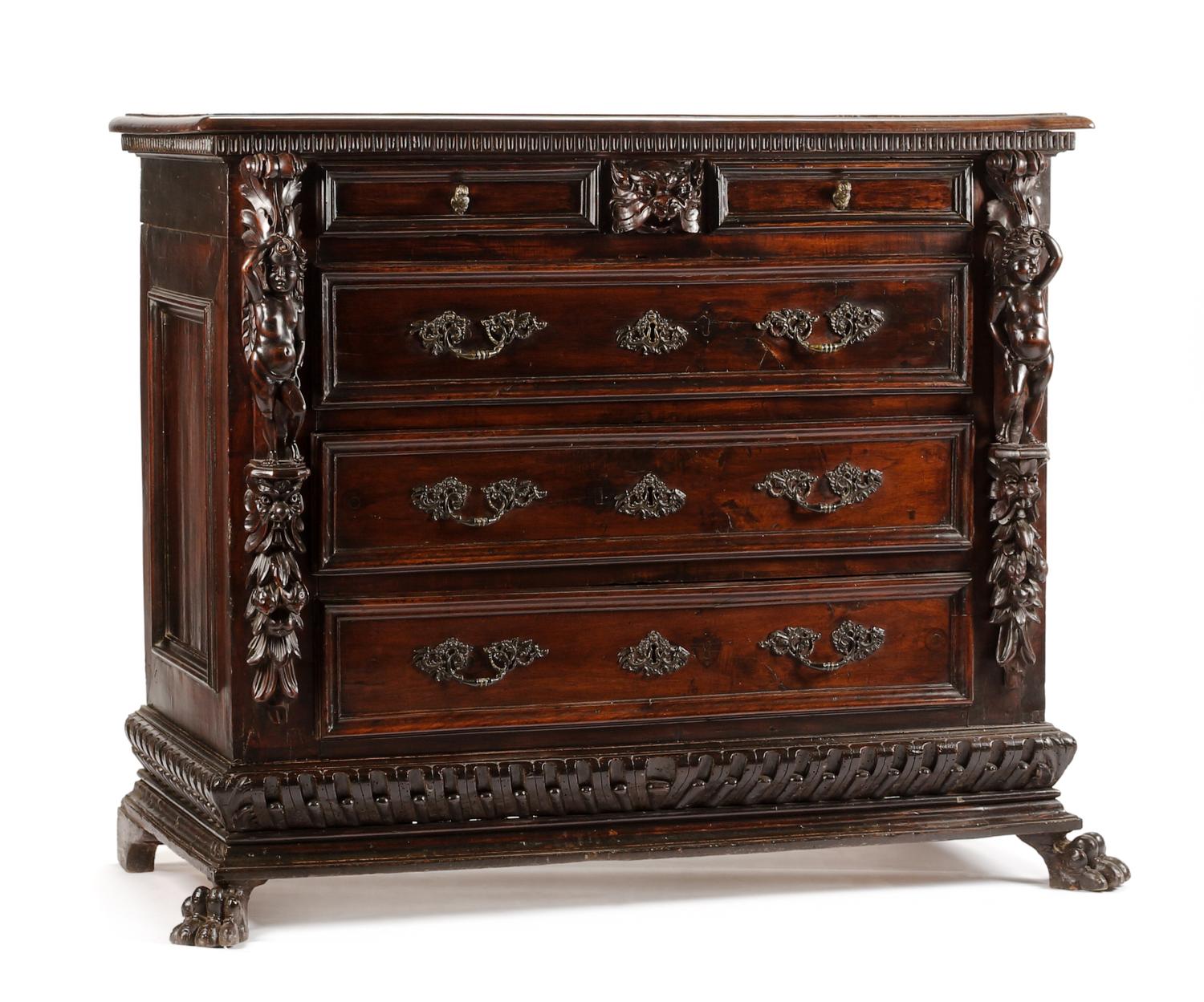 An Italian Renaissance Style Carved Chest of Drawers Height 46 x width 53 1/2 x depth 25 3/8 inches. — 17TH CENTURY AND LATER