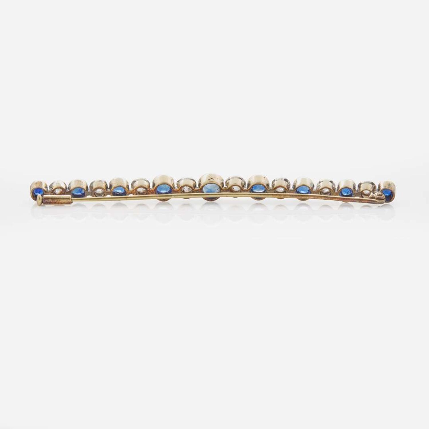 A 14K Yellow Gold, Diamond, and Sapphire Brooch