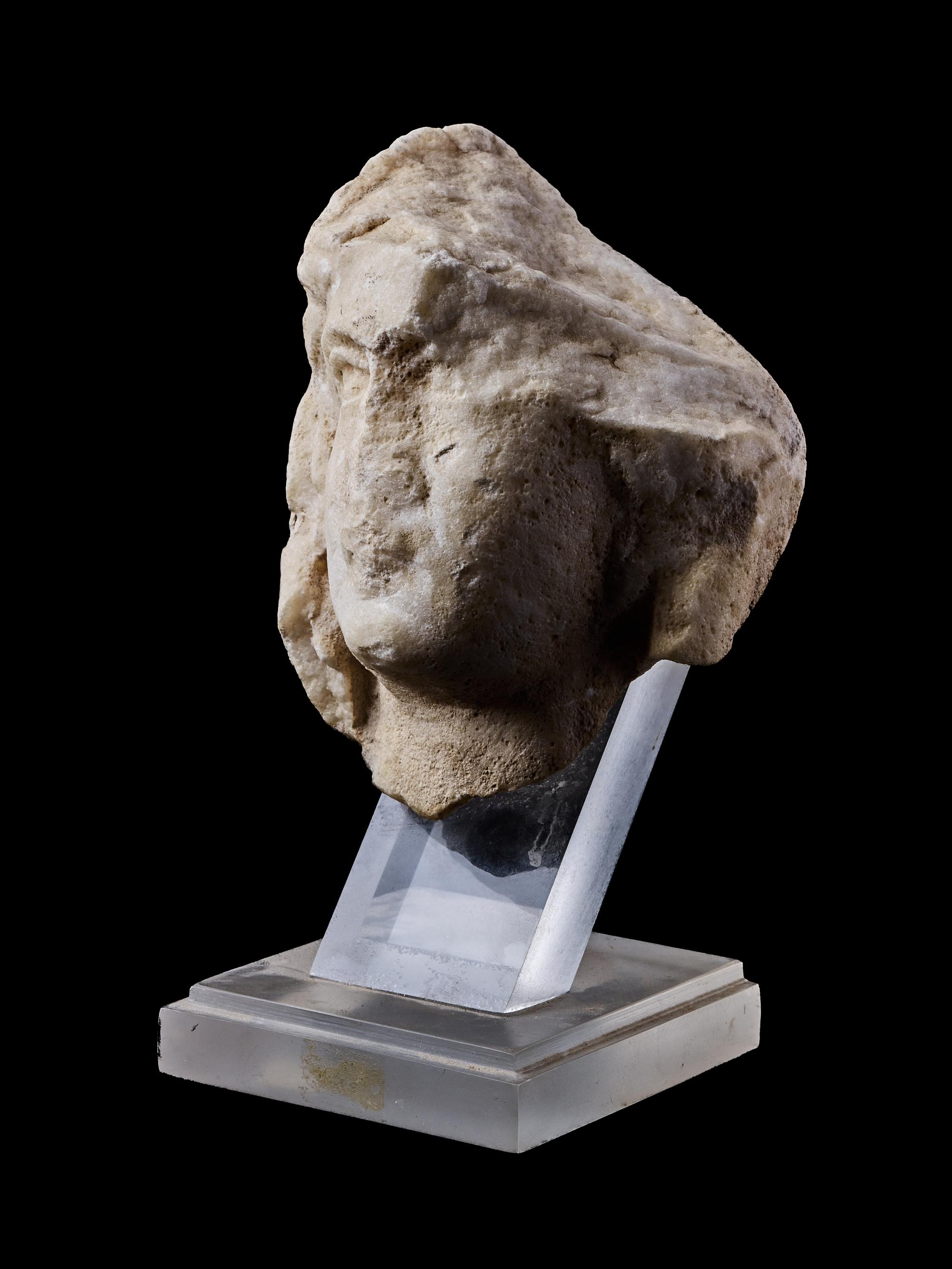 A Roman Marble Head of a Veiled Woman
