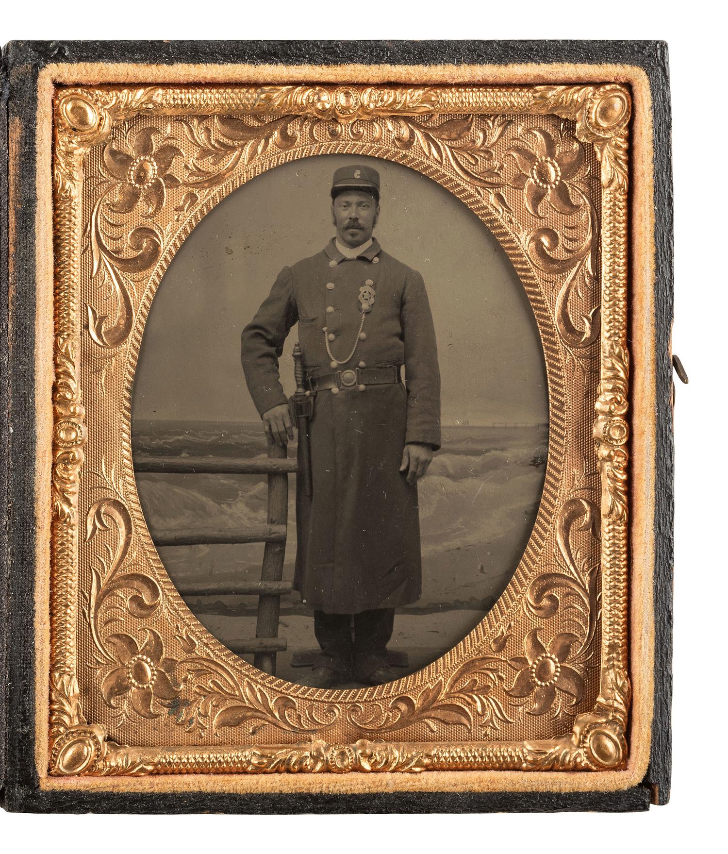 [AFRICAN AMERICANA - EARLY PHOTOGRAPHY]. Sixth plate tintype of an African American police officer.
