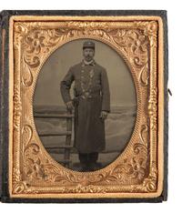 [AFRICAN AMERICANA - EARLY PHOTOGRAPHY]. Sixth plate tintype of an African American police officer.