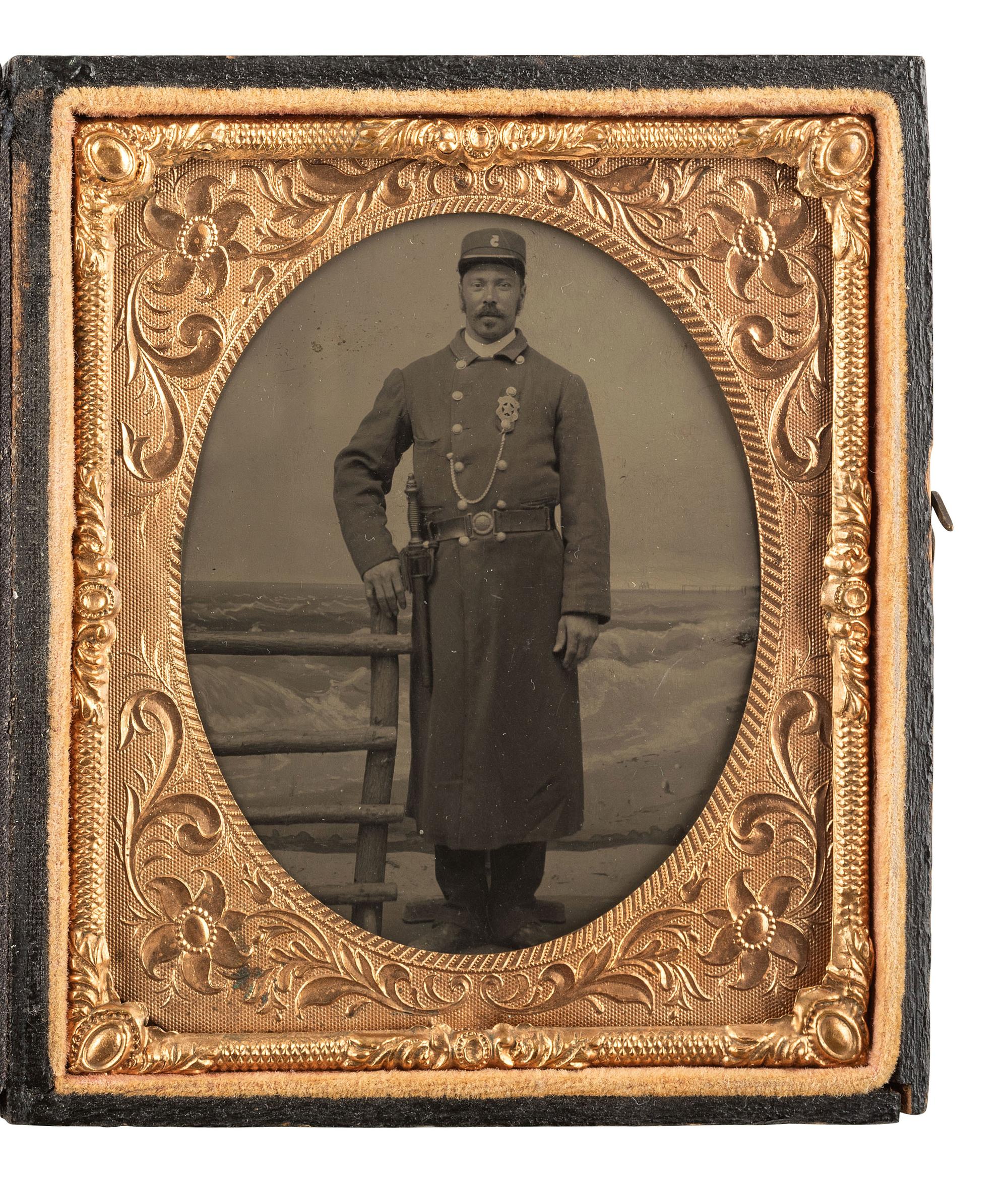 [AFRICAN AMERICANA - EARLY PHOTOGRAPHY]. Sixth plate tintype of an African American police officer.