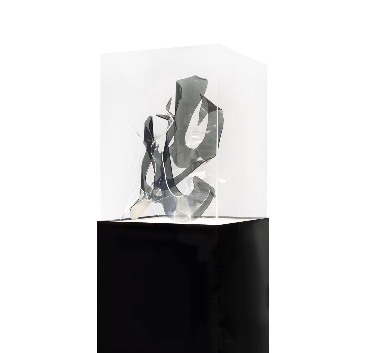 Sculpture and Lighted Pedestal