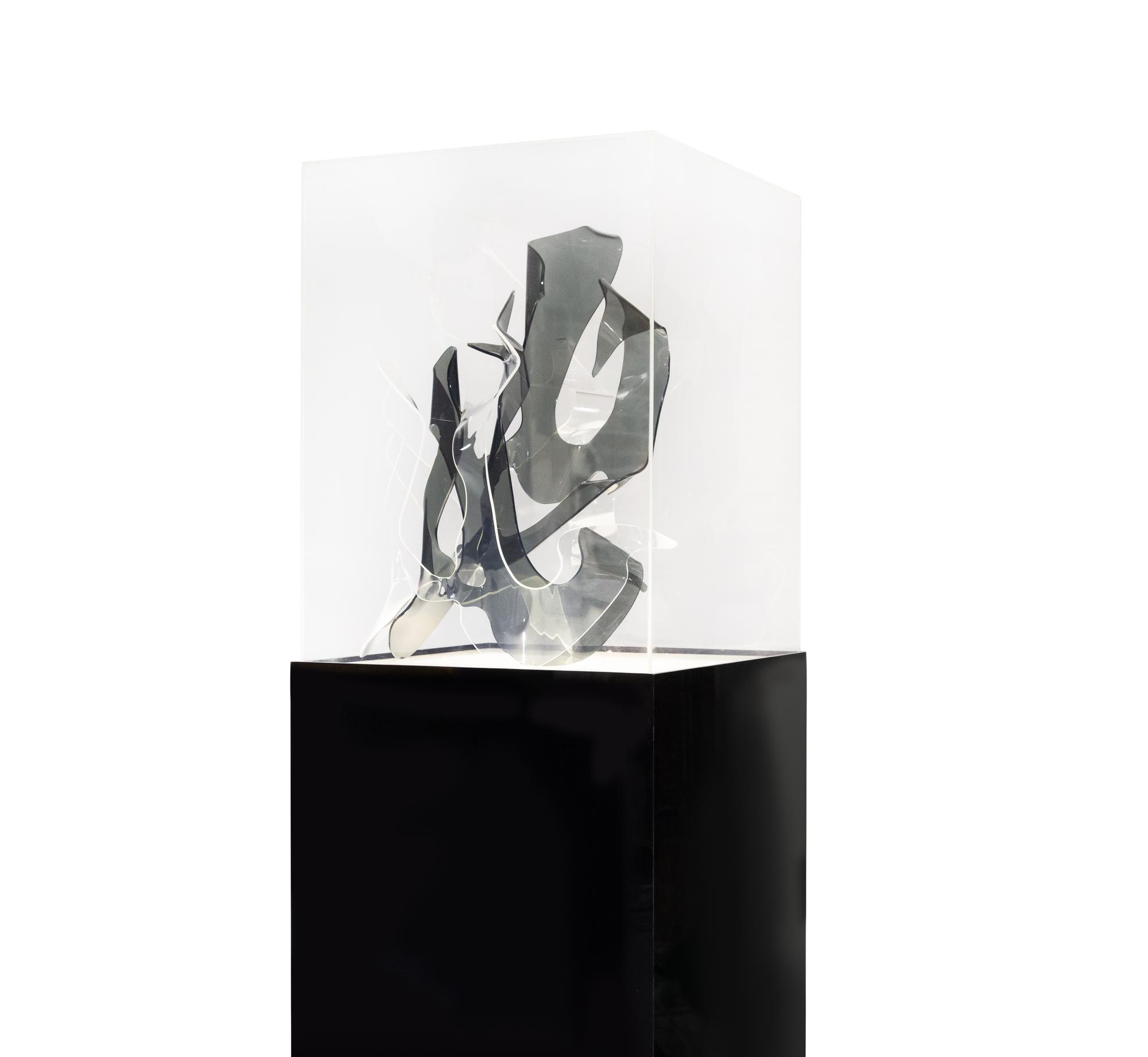 Sculpture and Lighted Pedestal