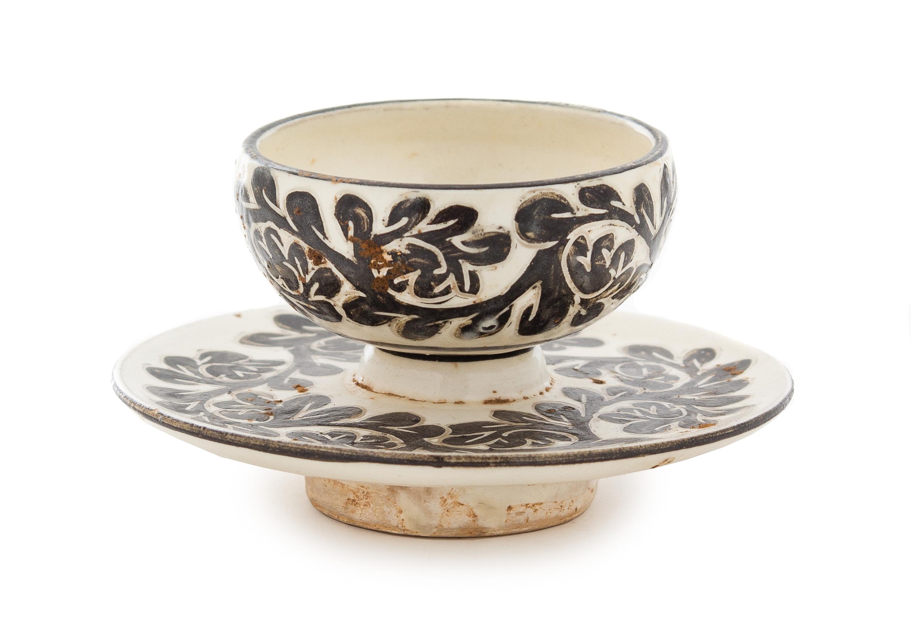 A Cizhou Tea Cup and Stand Total high 2 1/2 inches.