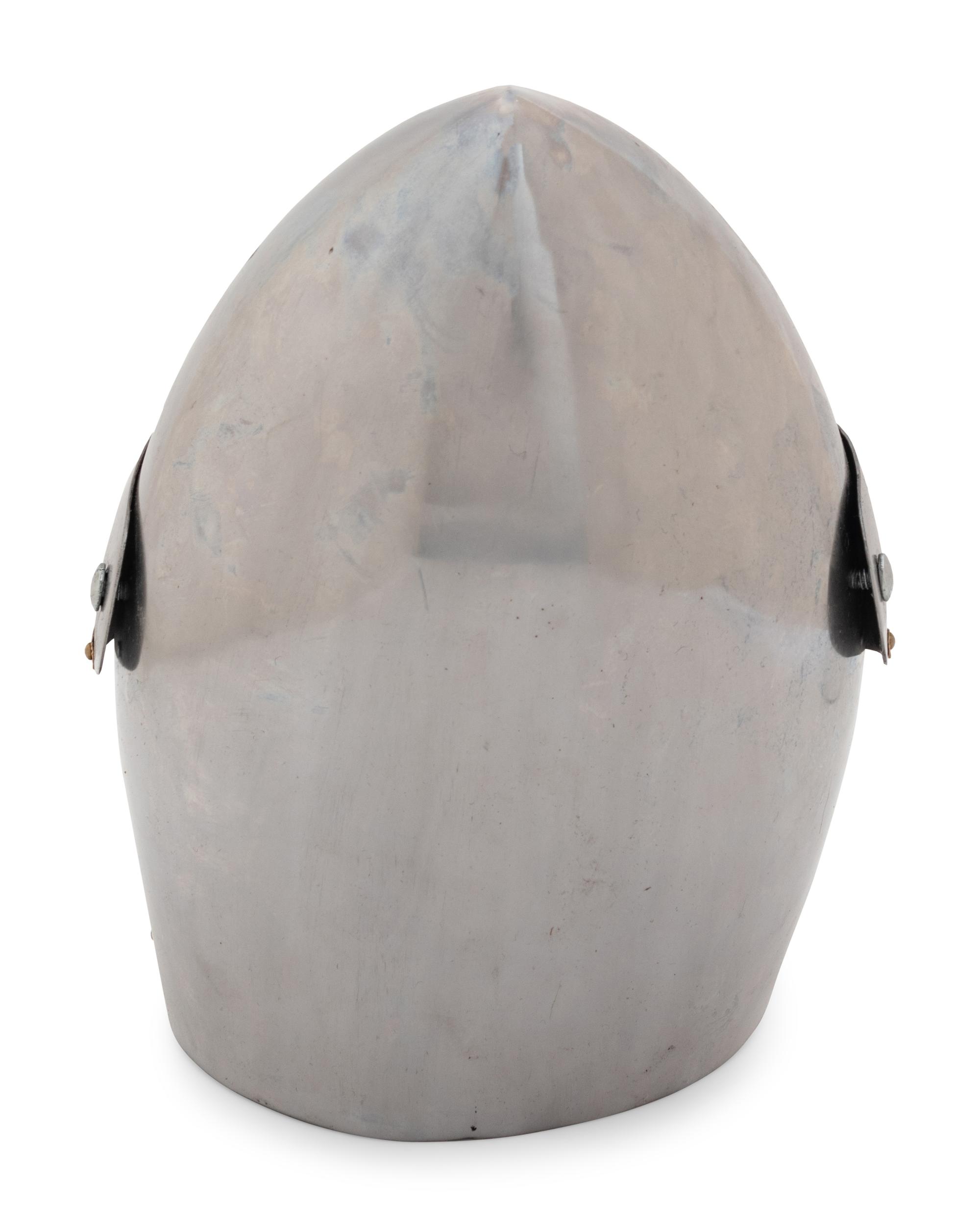 A Group of Four Pressed Metal Armor Helmets