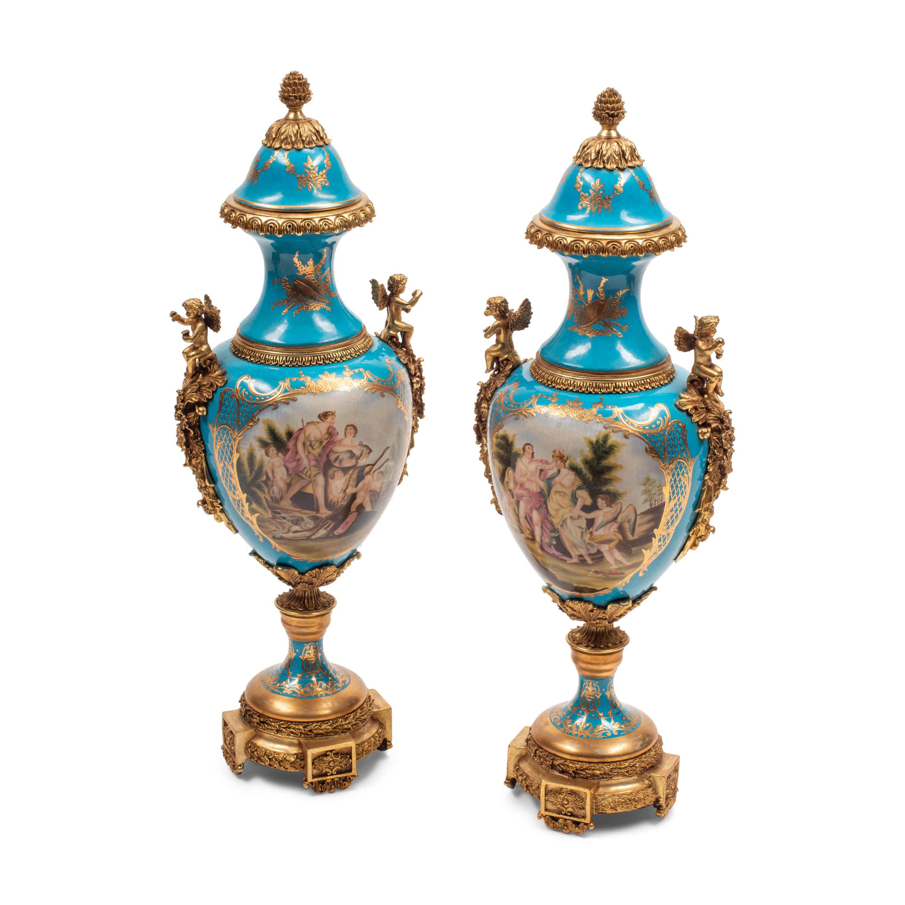 A Pair of Large Sèvres Style Porcelain and Gilt Bronze Mounted Vases and Covers