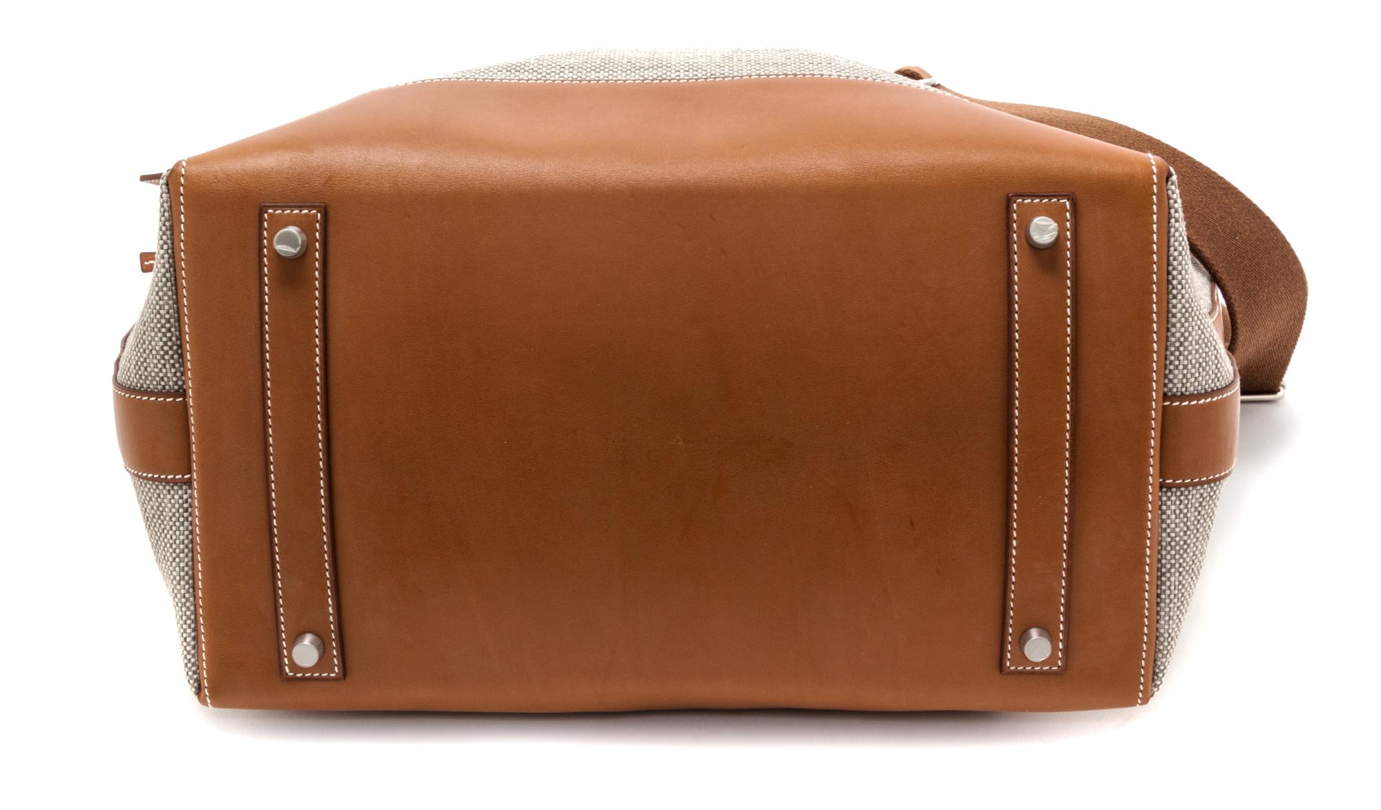 An Hermes Ecru Canvas and Fawn Barenia Calfskin Caleche-Express Medium Tote, 15.3" 14.1" 7.8".