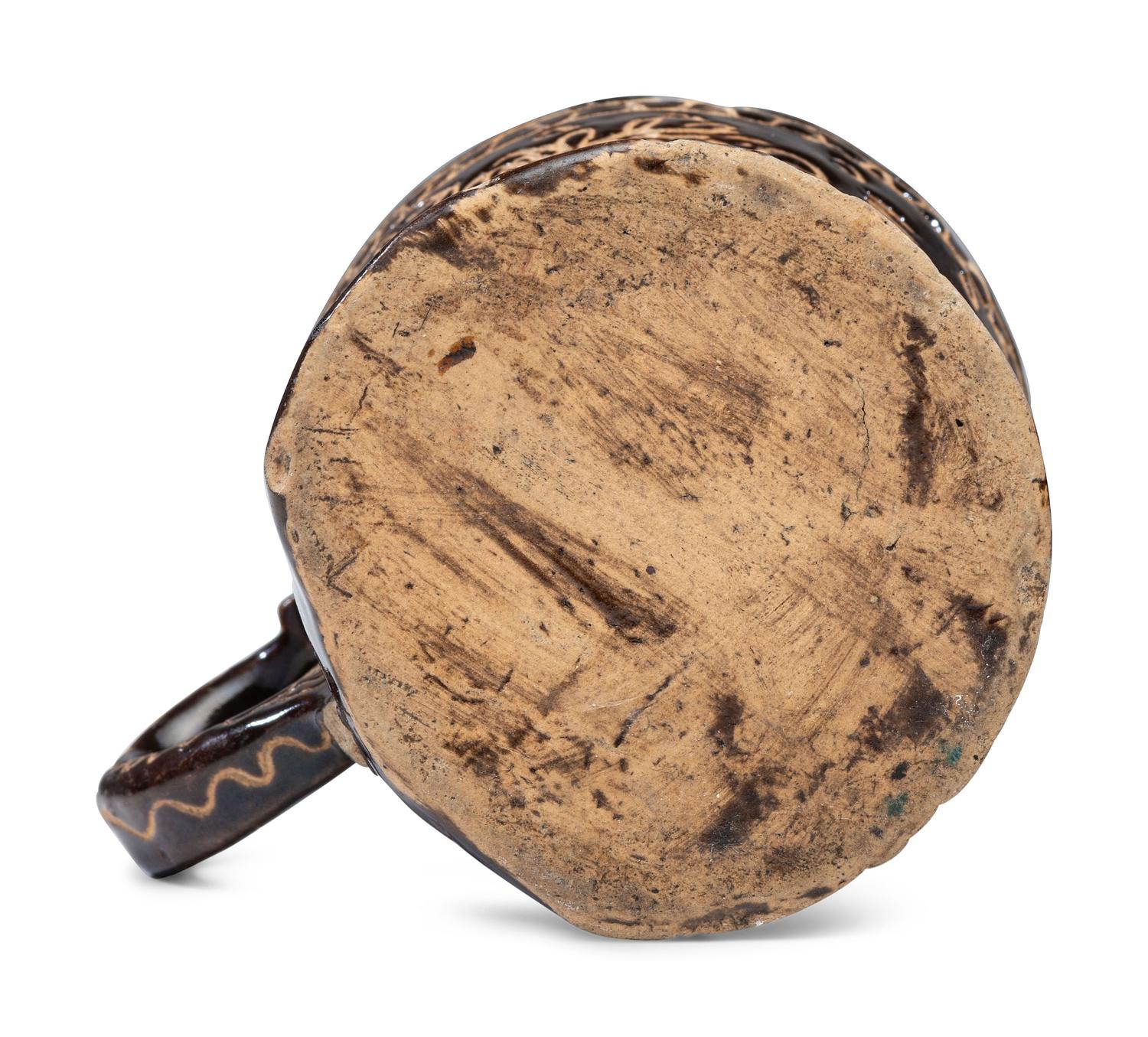 A Slip-Glazed and Incised Mug