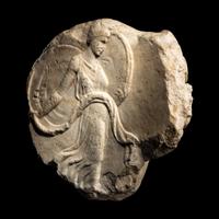 A Roman Marble Oscillum with a Dancing Maenad