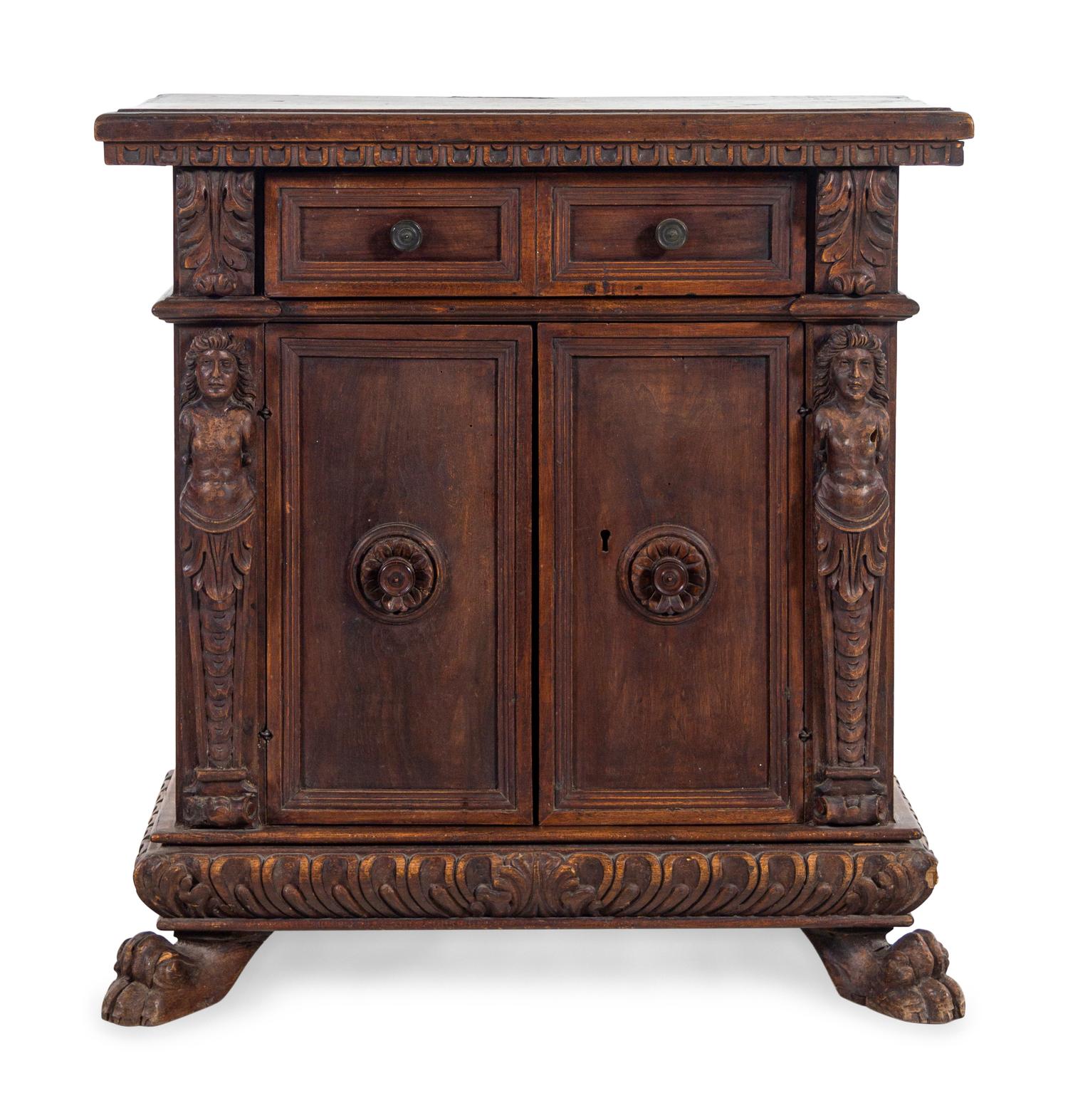 An Italian Baroque Walnut Cabinet