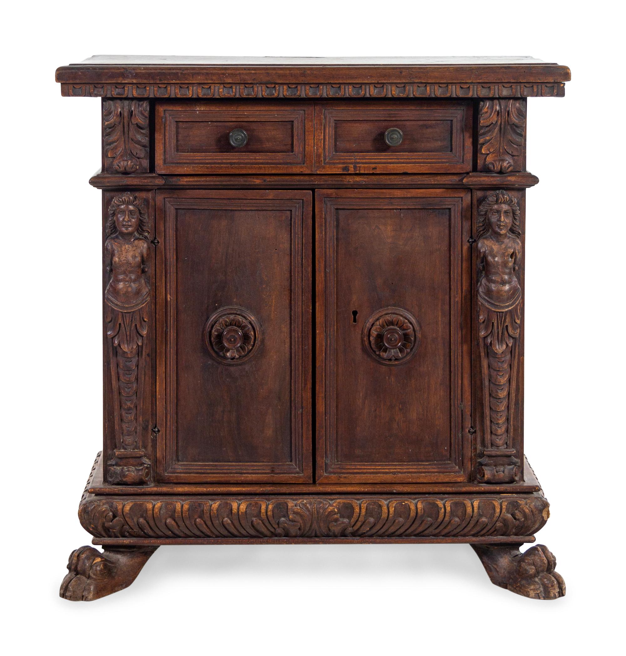 An Italian Baroque Walnut Cabinet