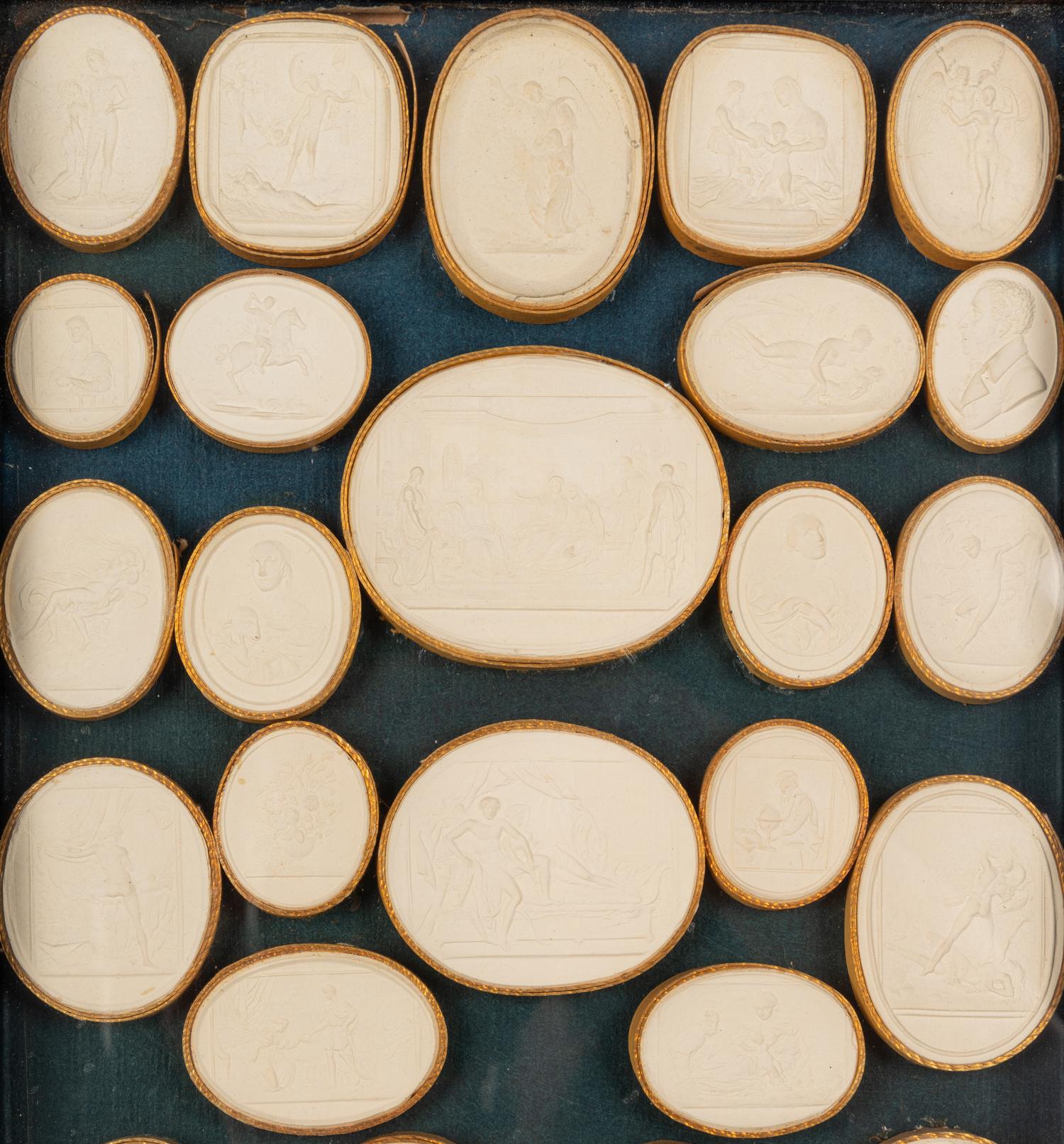 A Collection of Grand Tour Style Plaster Intaglios in Four Frames