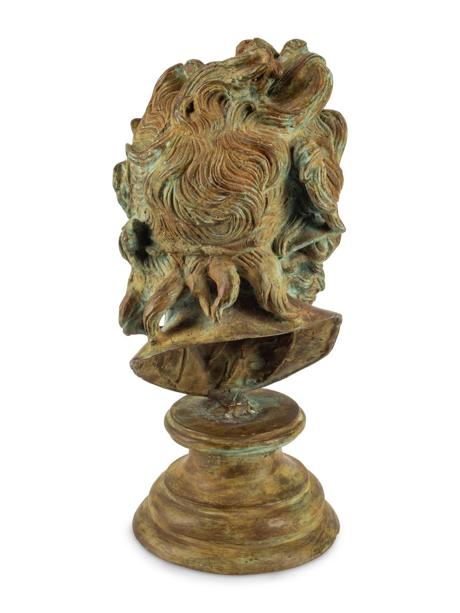 A Continental Patinated Bronze Head of a Man