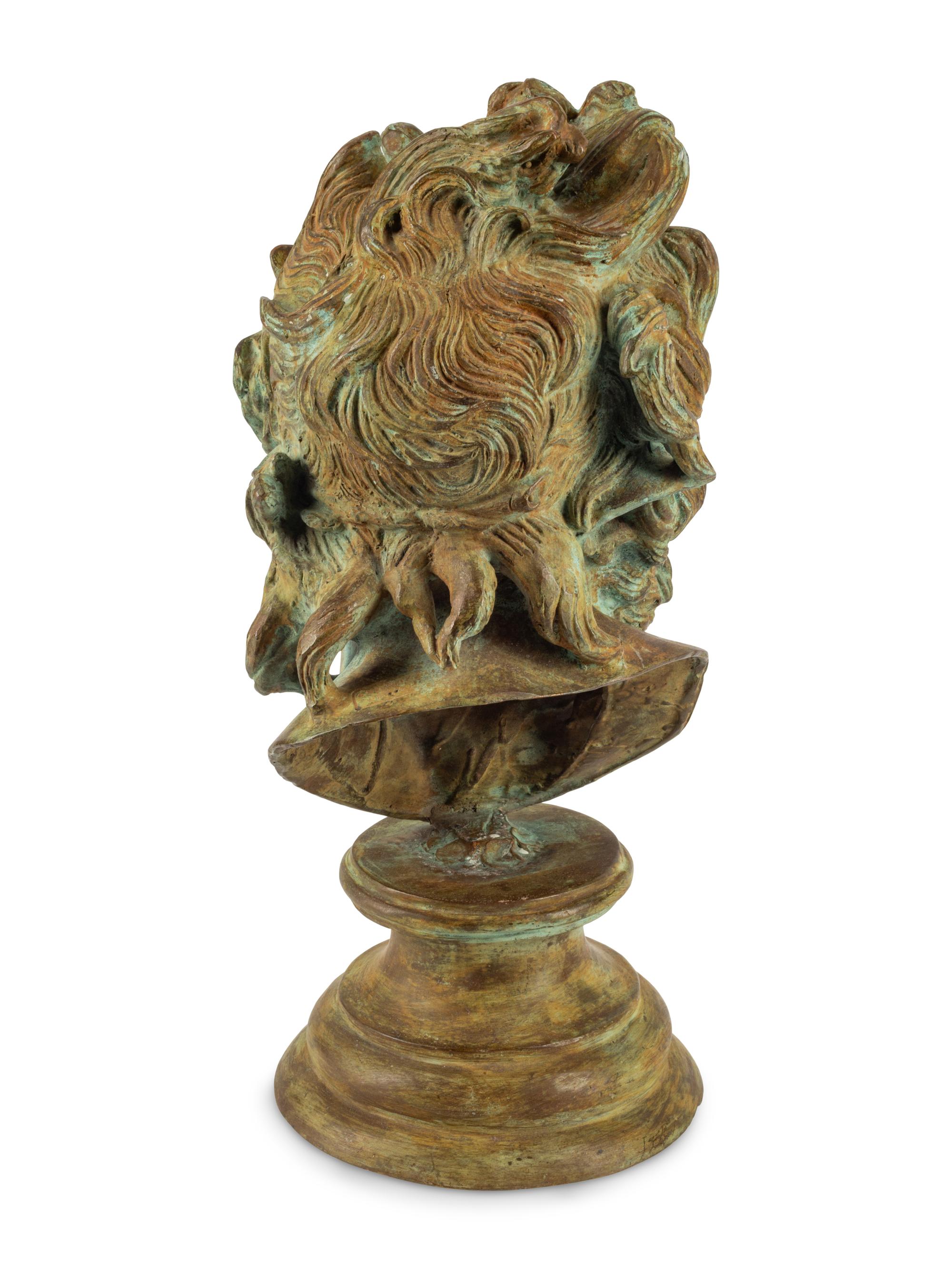 A Continental Patinated Bronze Head of a Man