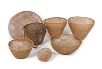 Seven Open Weave Gathering Baskets Diameter of largest 26 1/2 inches.