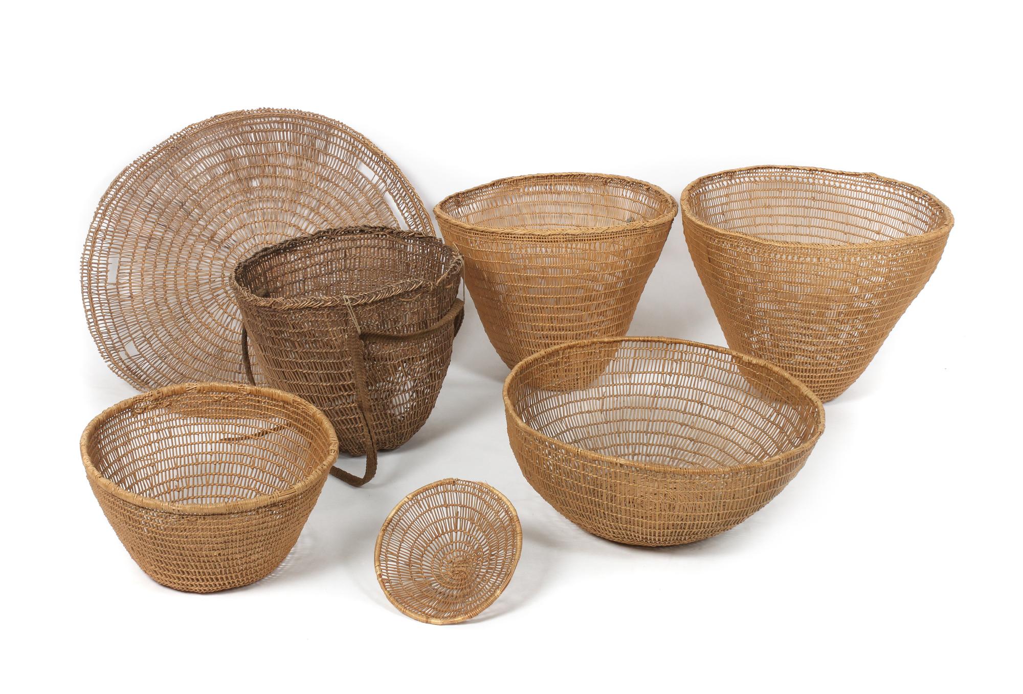 Seven Open Weave Gathering Baskets Diameter of largest 26 1/2 inches.