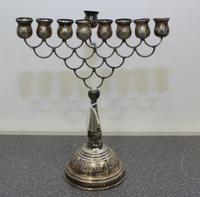 A Continental Silver Menorah Height 8 1/4 inches.