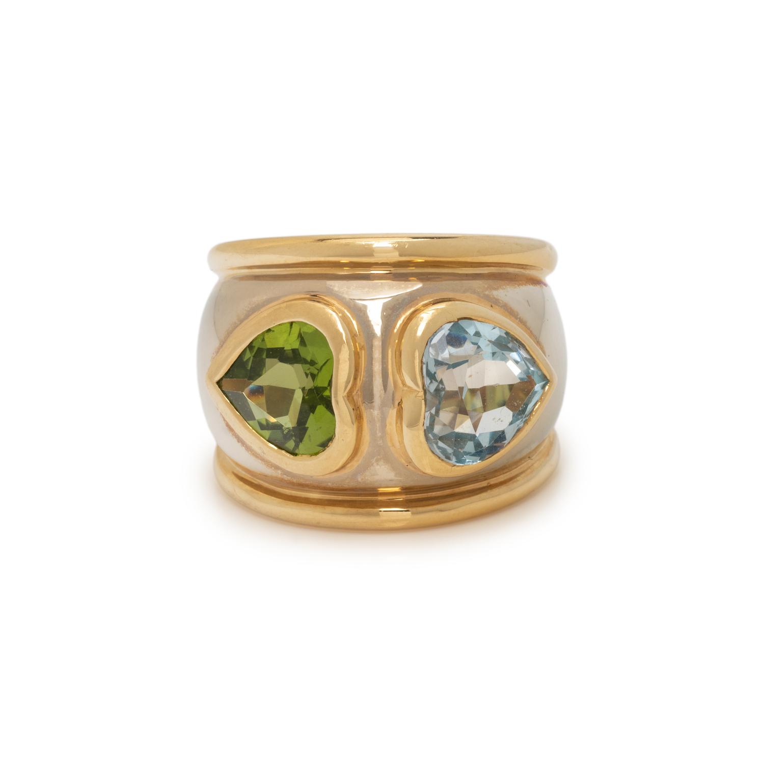 PERIDOT, BLUE TOPAZ, AND BICOLOR GOLD RING