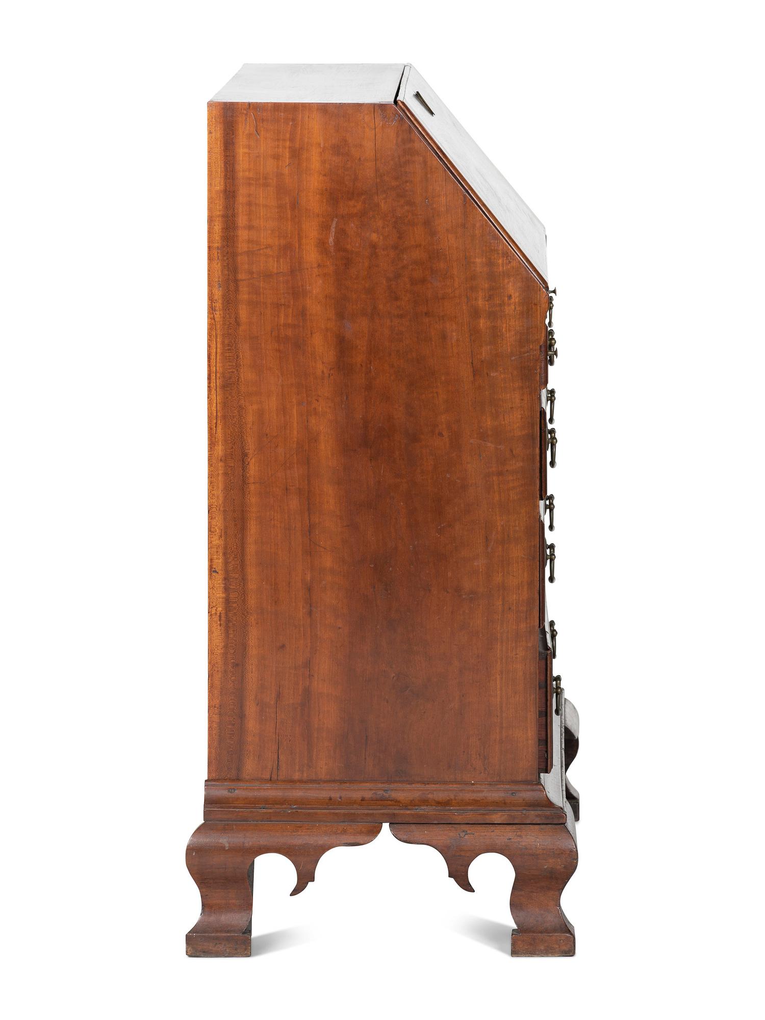 A Chippendale Carved Cherrywood Slant-Front Desk