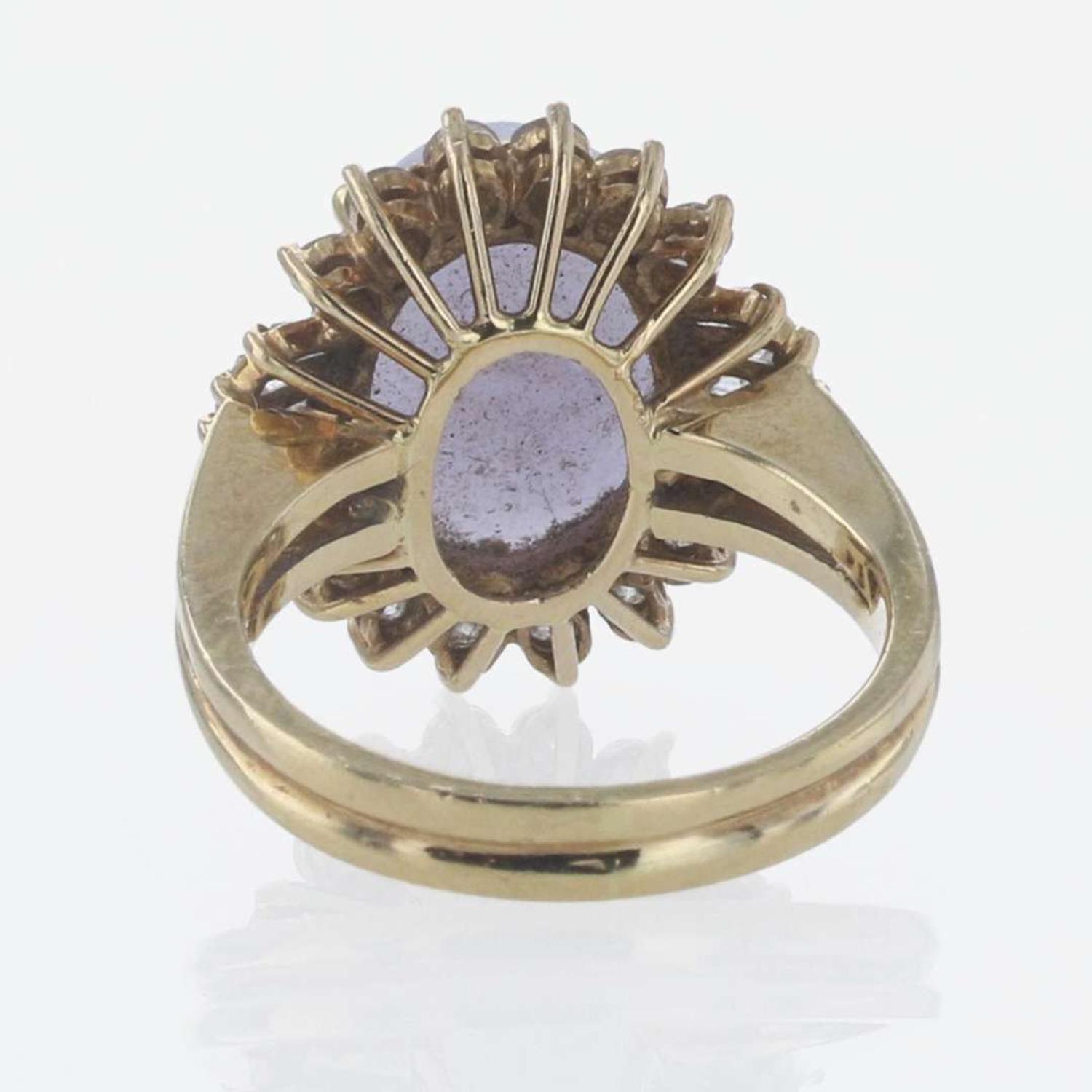 An 18K Lavender Jade Ring