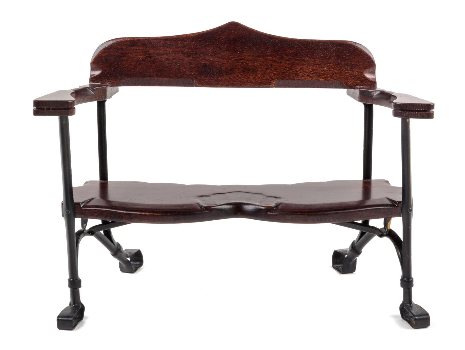 A Mahogany and Enameled Metal Bench Height 4 1/8 x width 5 3/8 x depth 3 1/4 inches.