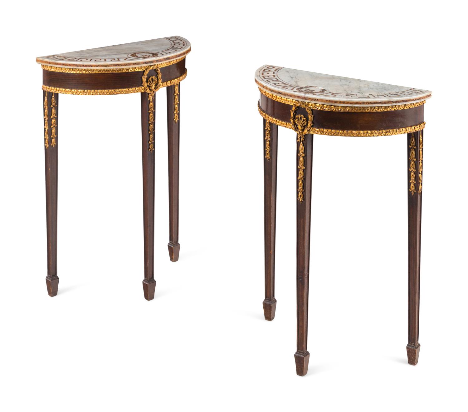 A Pair of Neoclassical Parcel-Gilt Mahogany Marble-Top Demilune Tables