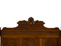A Renaissance Revival Carved Oak Headboard
