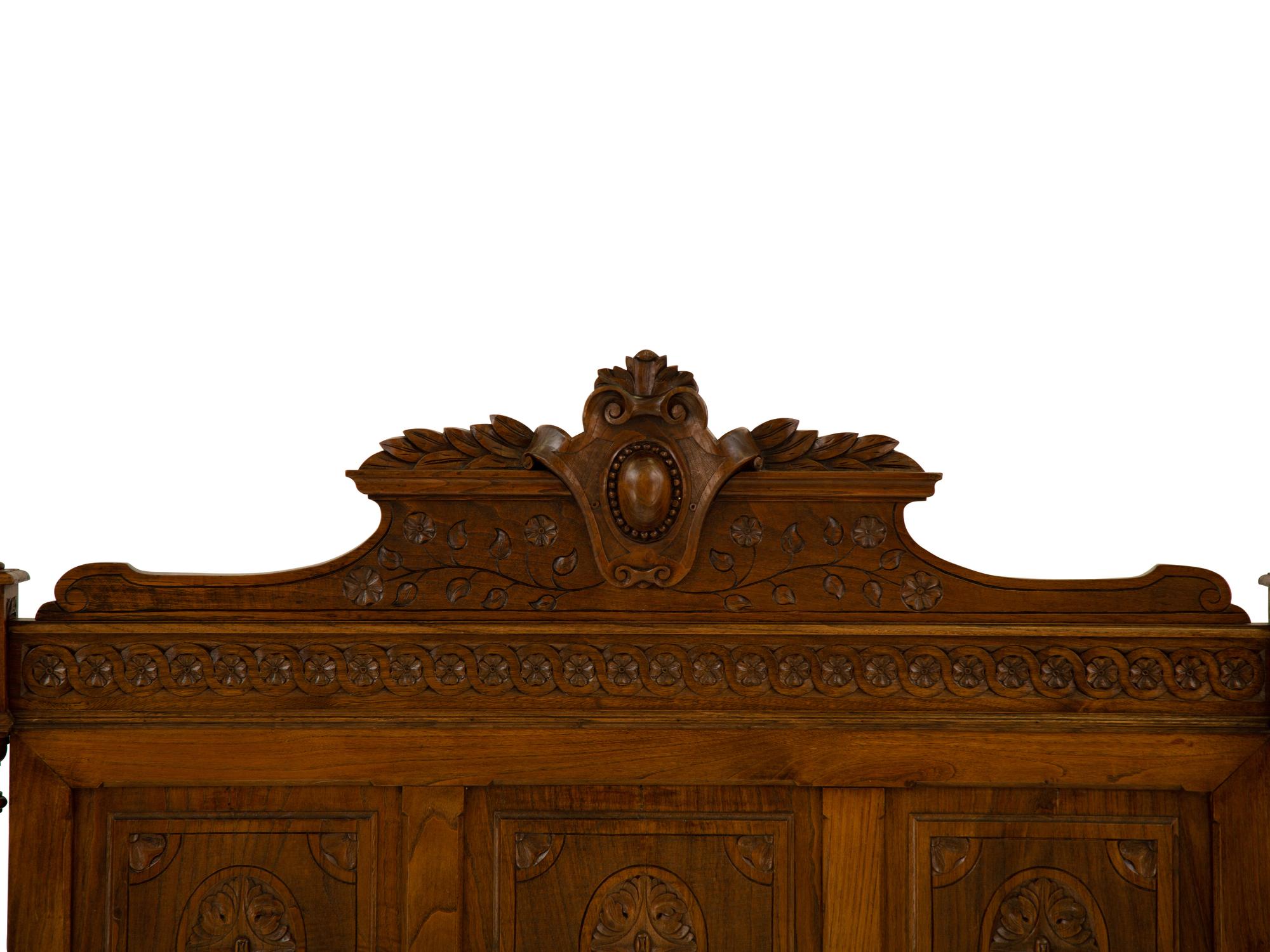 A Renaissance Revival Carved Oak Headboard