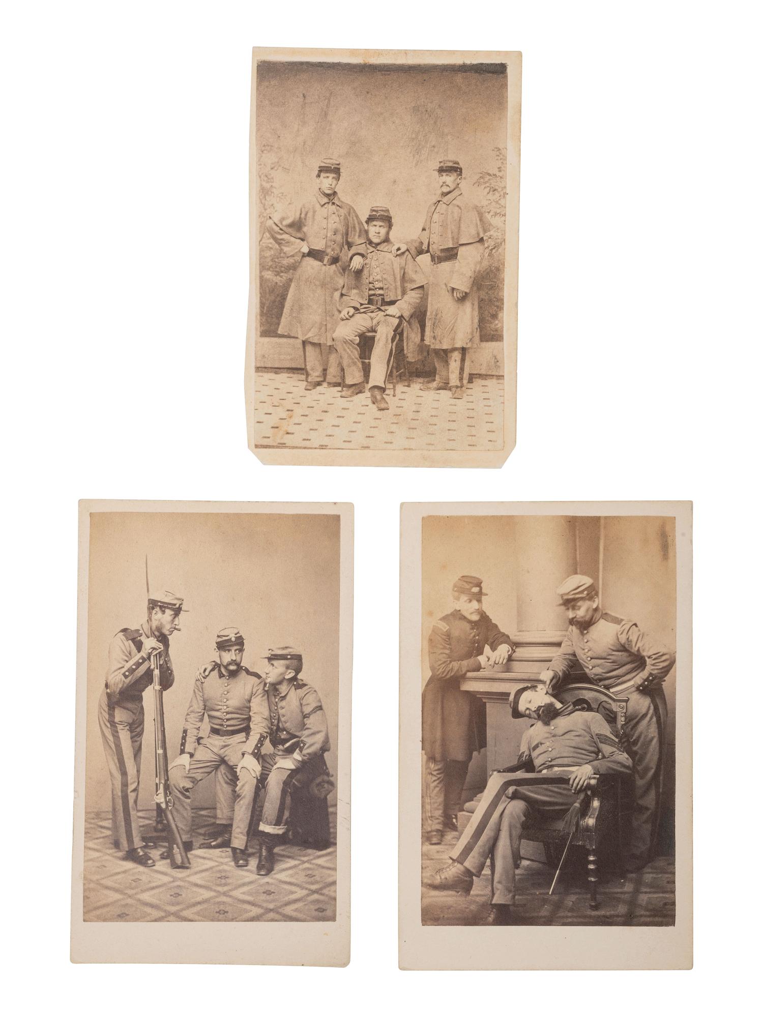 [CIVIL WAR]. 7 CDVs featuring formal and playful studio portraits of 7th New York State Militiamen.