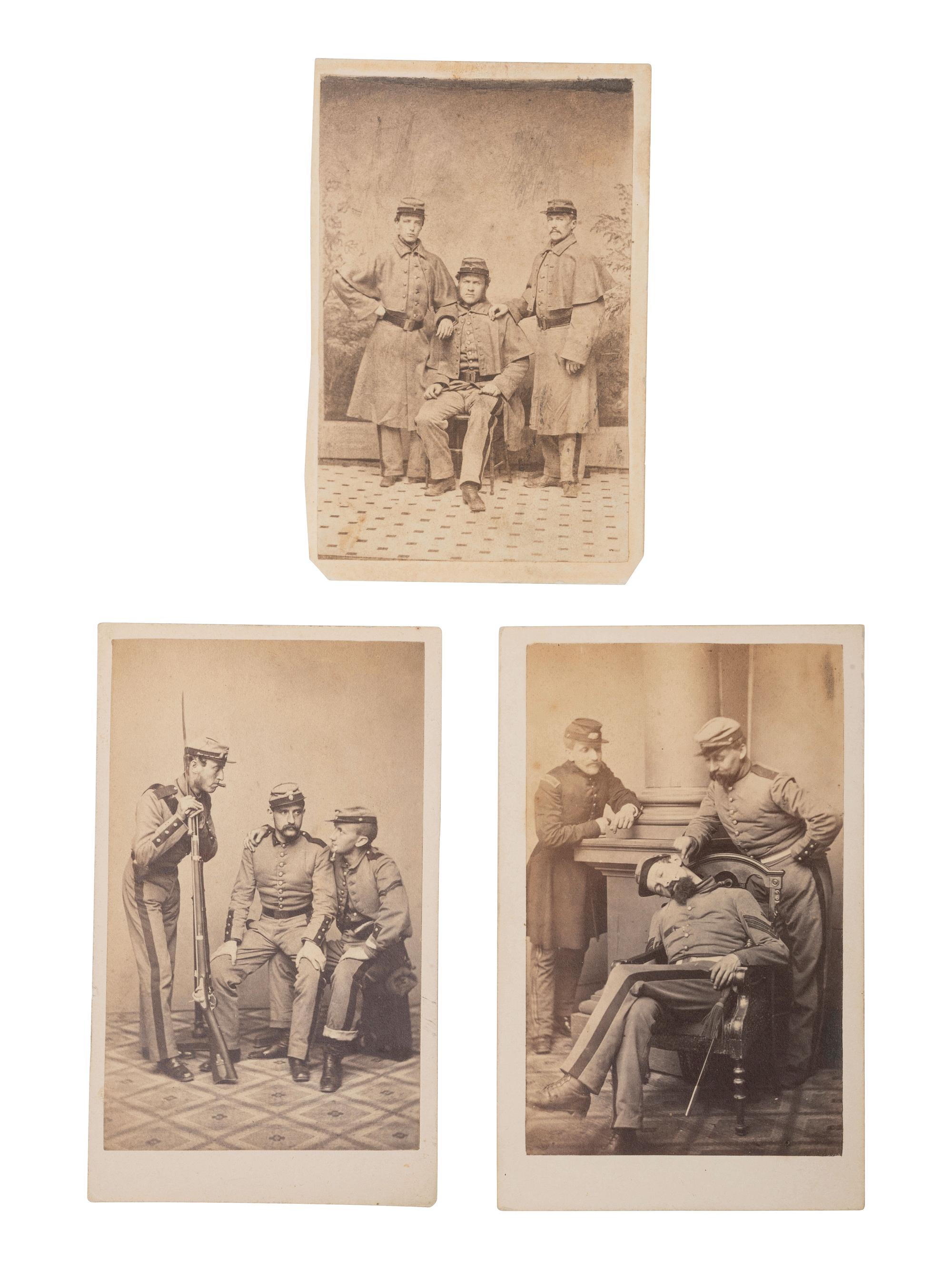 [CIVIL WAR]. 7 CDVs featuring formal and playful studio portraits of 7th New York State Militiamen.
