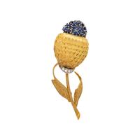 YELLOW GOLD, SYNTHETIC SAPPHIRE, AND DIAMOND FLOWER BROOCH
