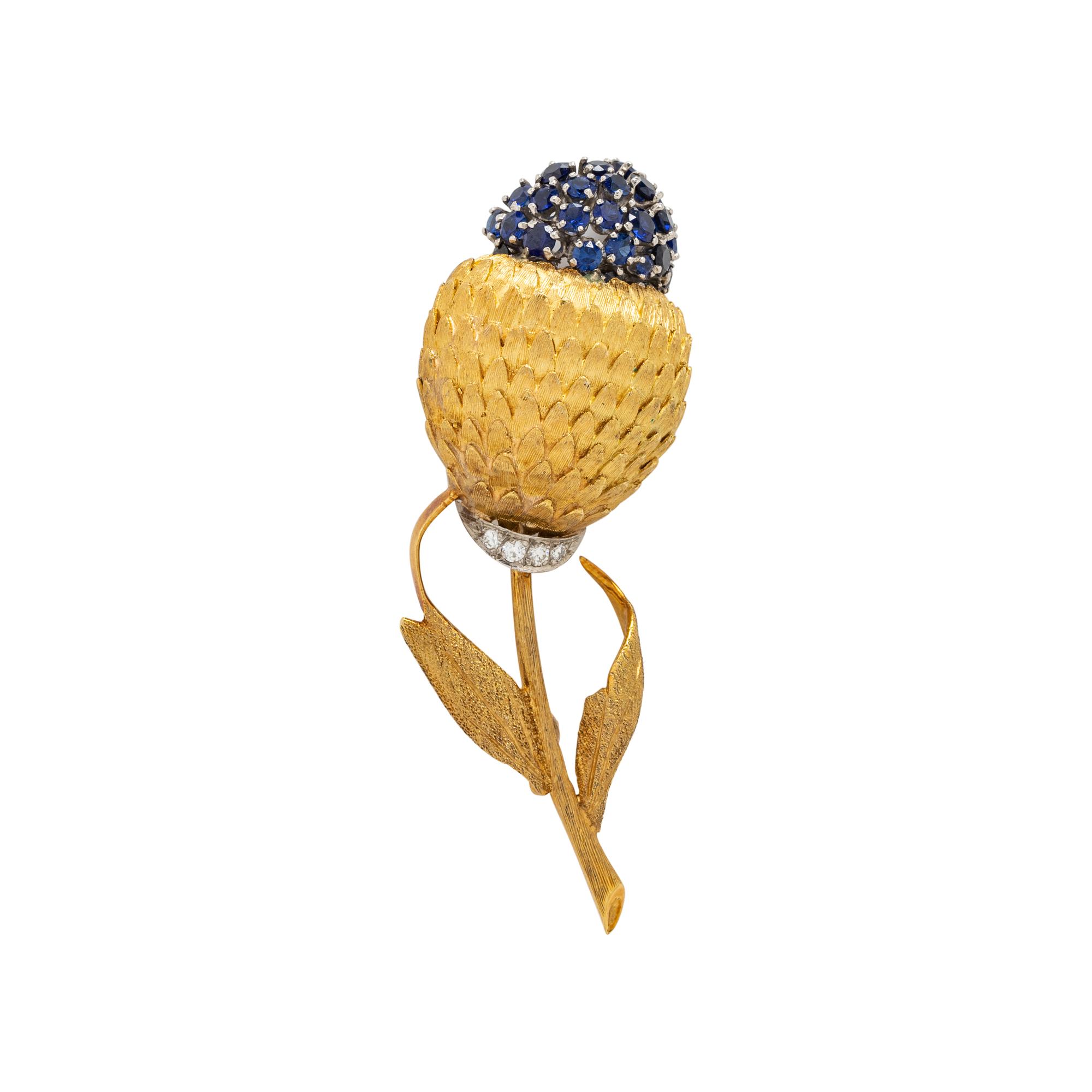 YELLOW GOLD, SYNTHETIC SAPPHIRE, AND DIAMOND FLOWER BROOCH