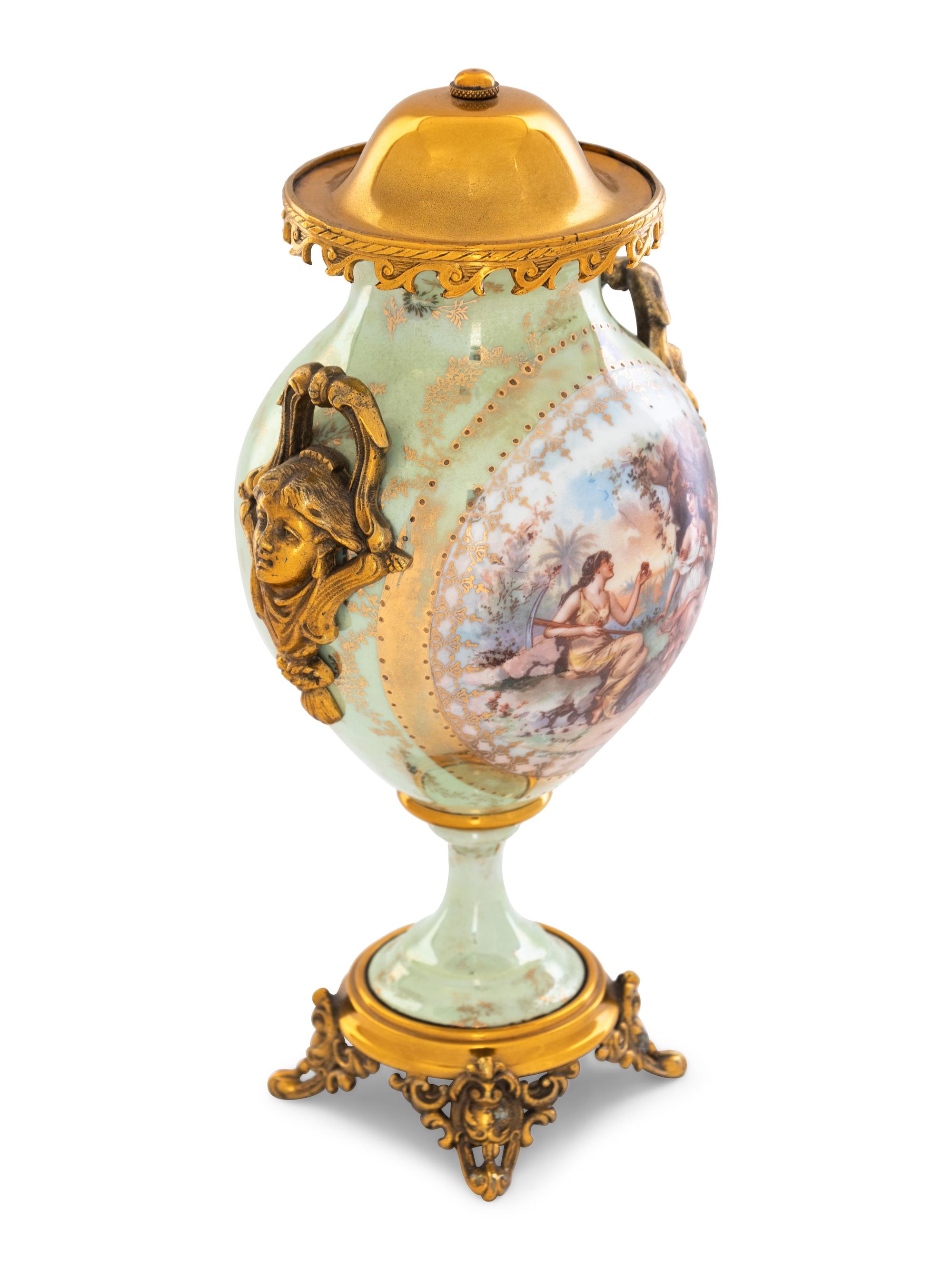 A Vienna Style Gilt Metal Mounted Porcelain Covered Urn