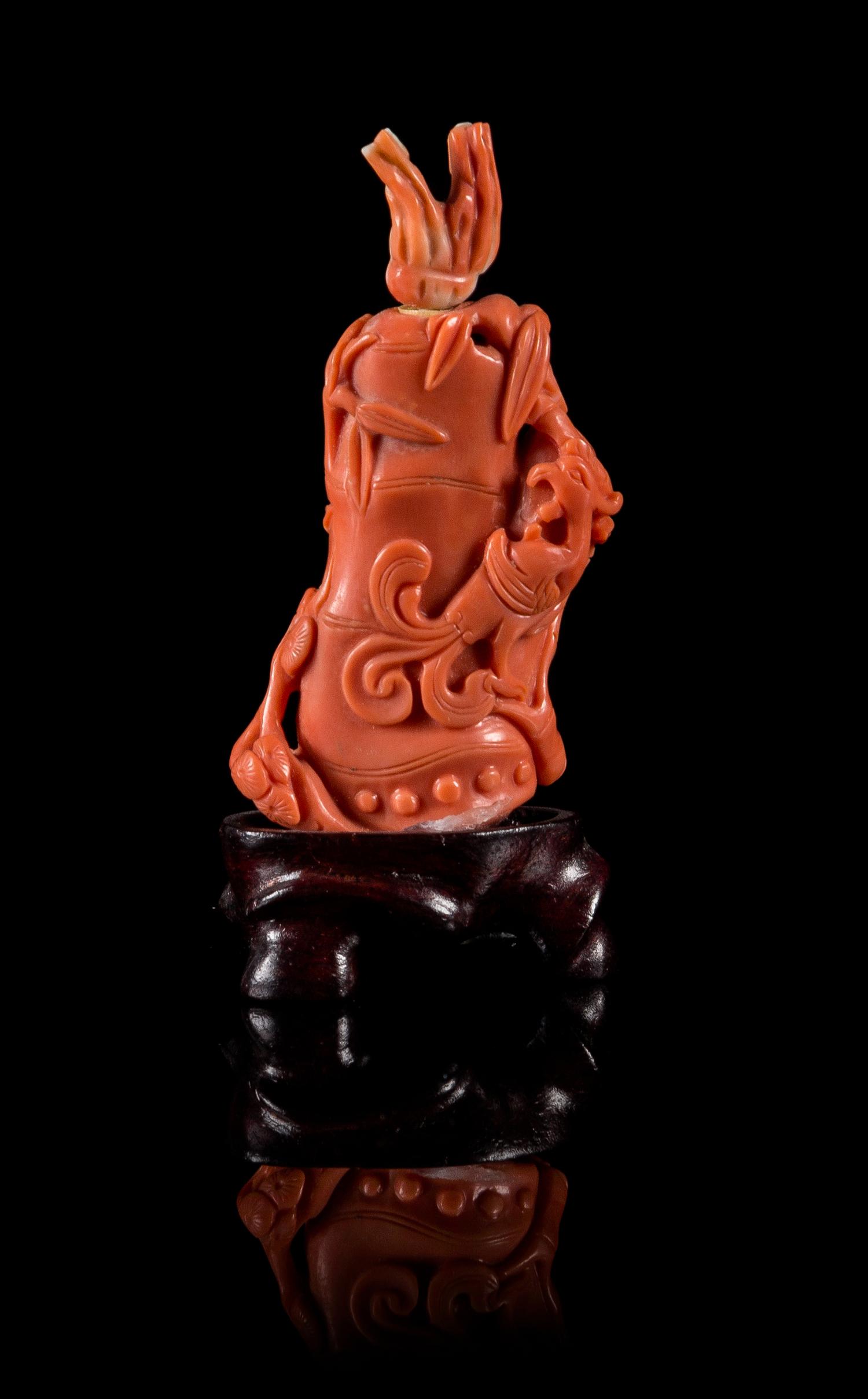 A Small Red Coral Snuff Bottle Height 2 7/8 inches.
