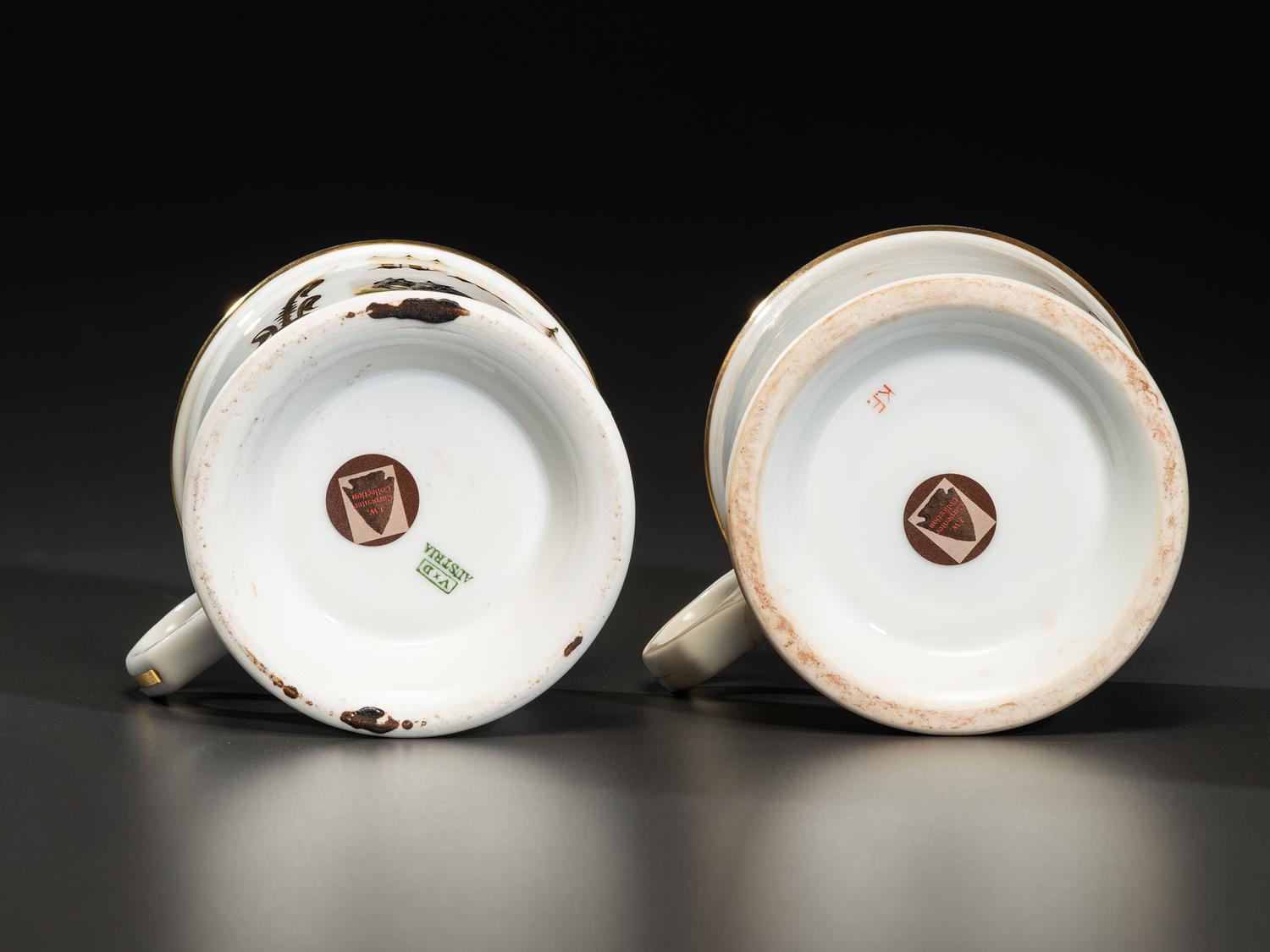 Two Porcelain Shaving Mugs Featuring Horse-Drawn Hearses