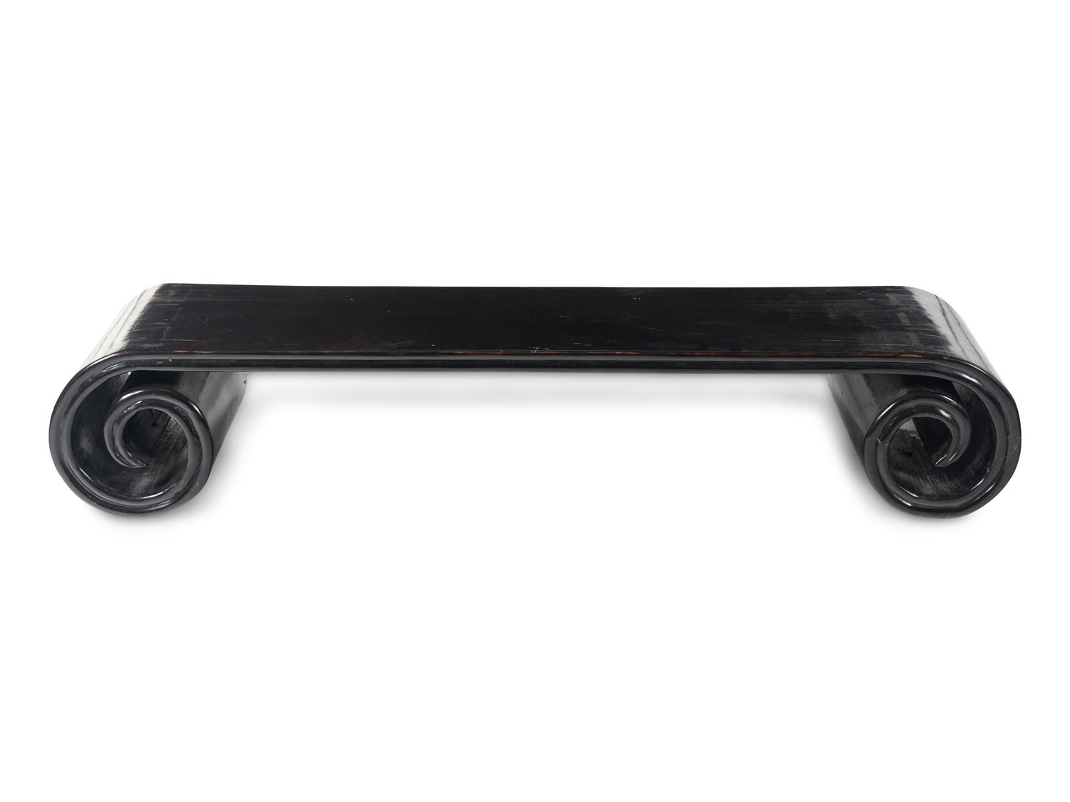 A Chinese Black Lacquered Low Scrolled-Form Low Table, Qinzhuo