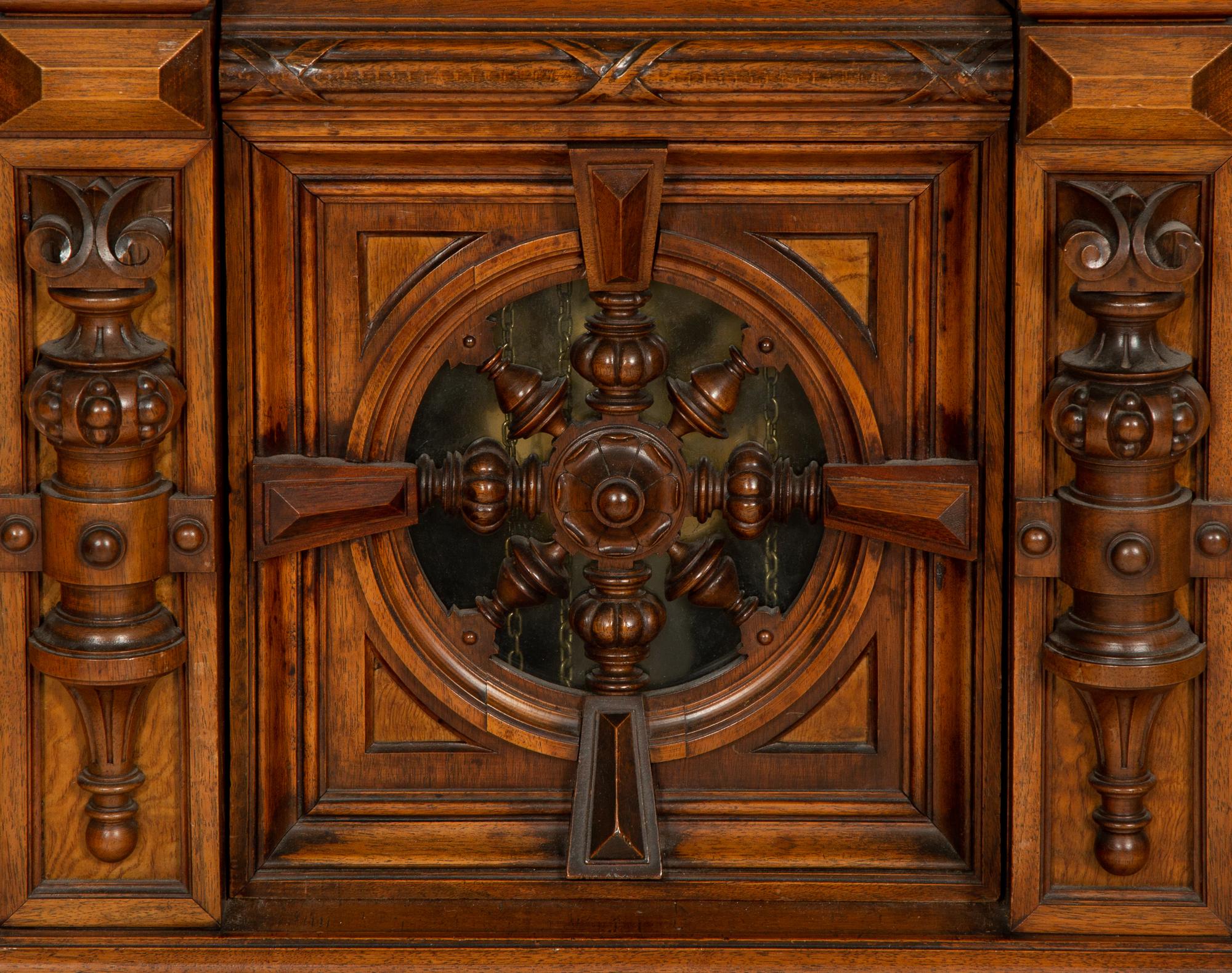A German Carved Walnut and Marquetry Tall Case Clock