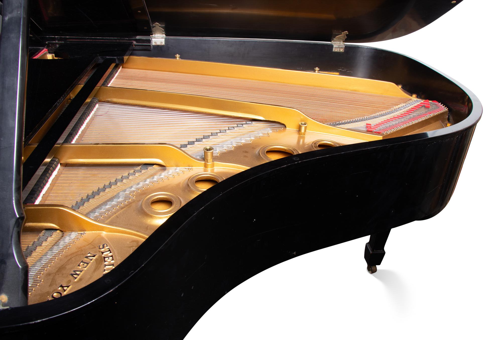 A Steinway and Sons Model L Black Lacquer Baby Grand Piano