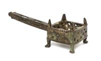 A Central Asian Bronze Incense Burner, Length 7 1/2 inches.