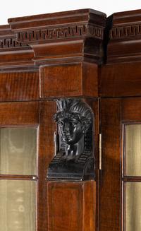 A Regency Part Ebonized Mahogany Breakfront Bookcase